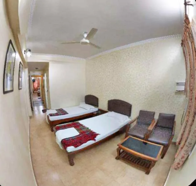 Bed in Hotel Rangoli