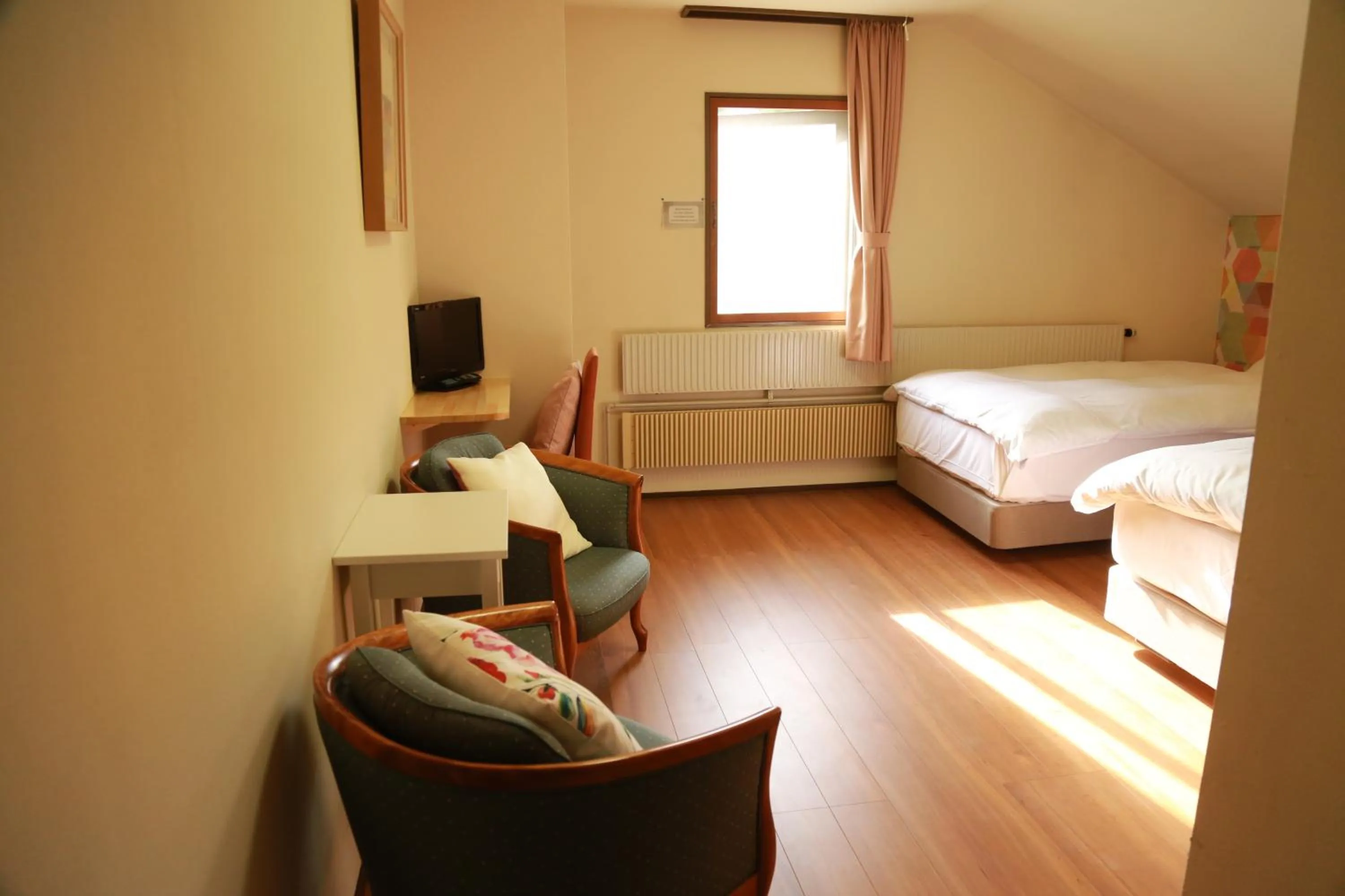 Bed in Hotel Tae Windsor