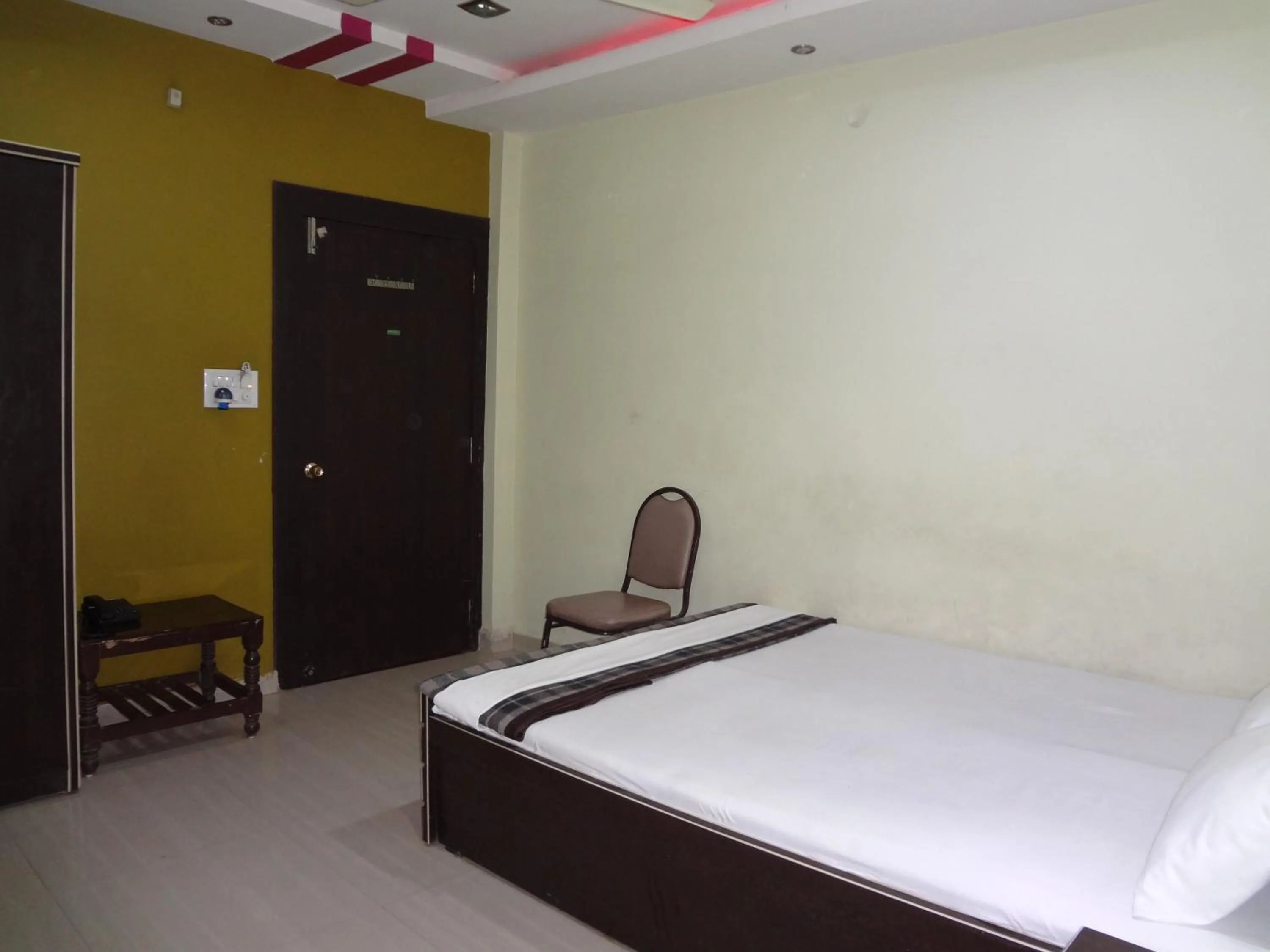 Bed in Hotel Parvati Palace Sehore