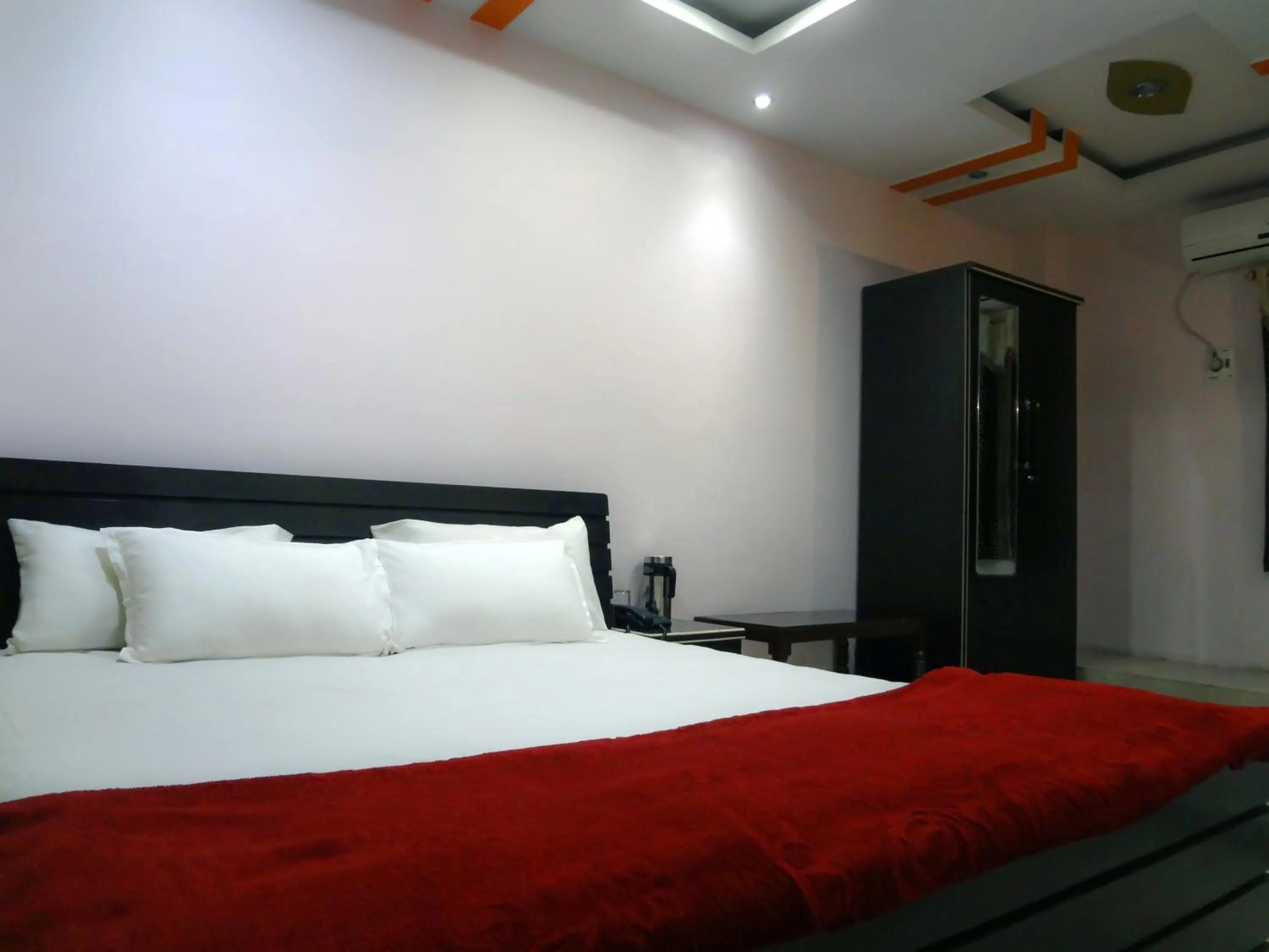 Bed in Hotel Parvati Palace Sehore