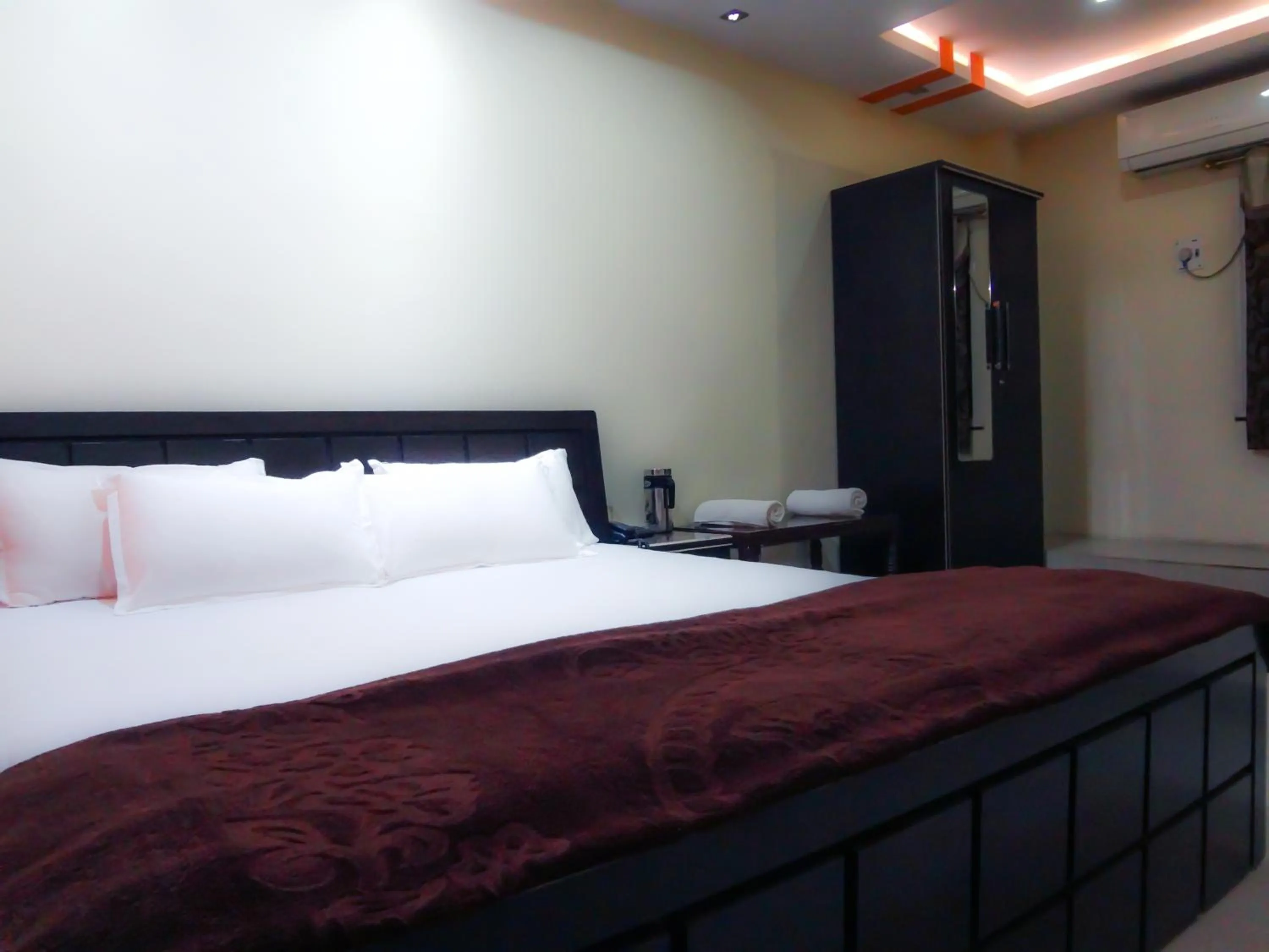 Bed in Hotel Parvati Palace Sehore