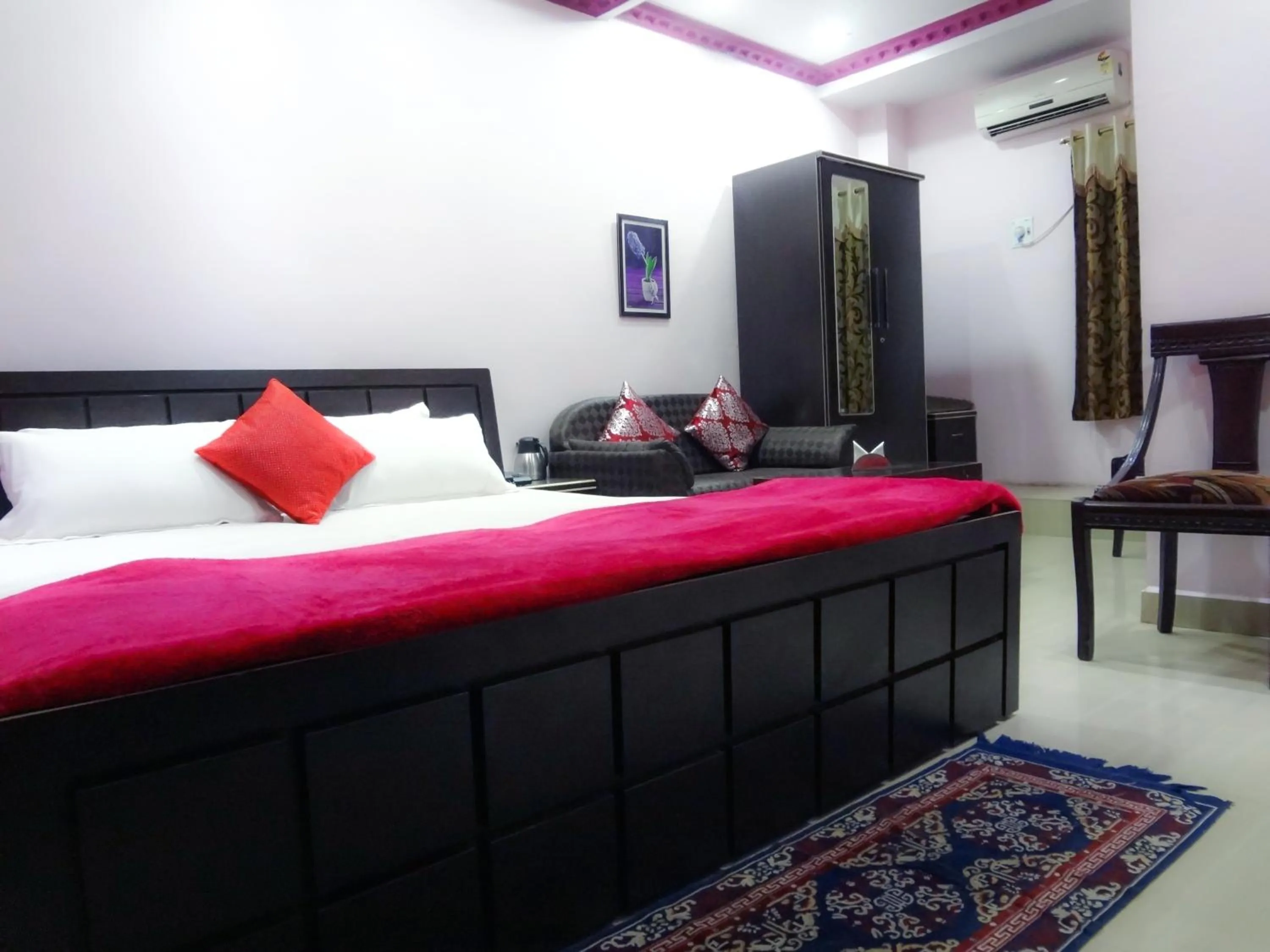 Bed in Hotel Parvati Palace Sehore