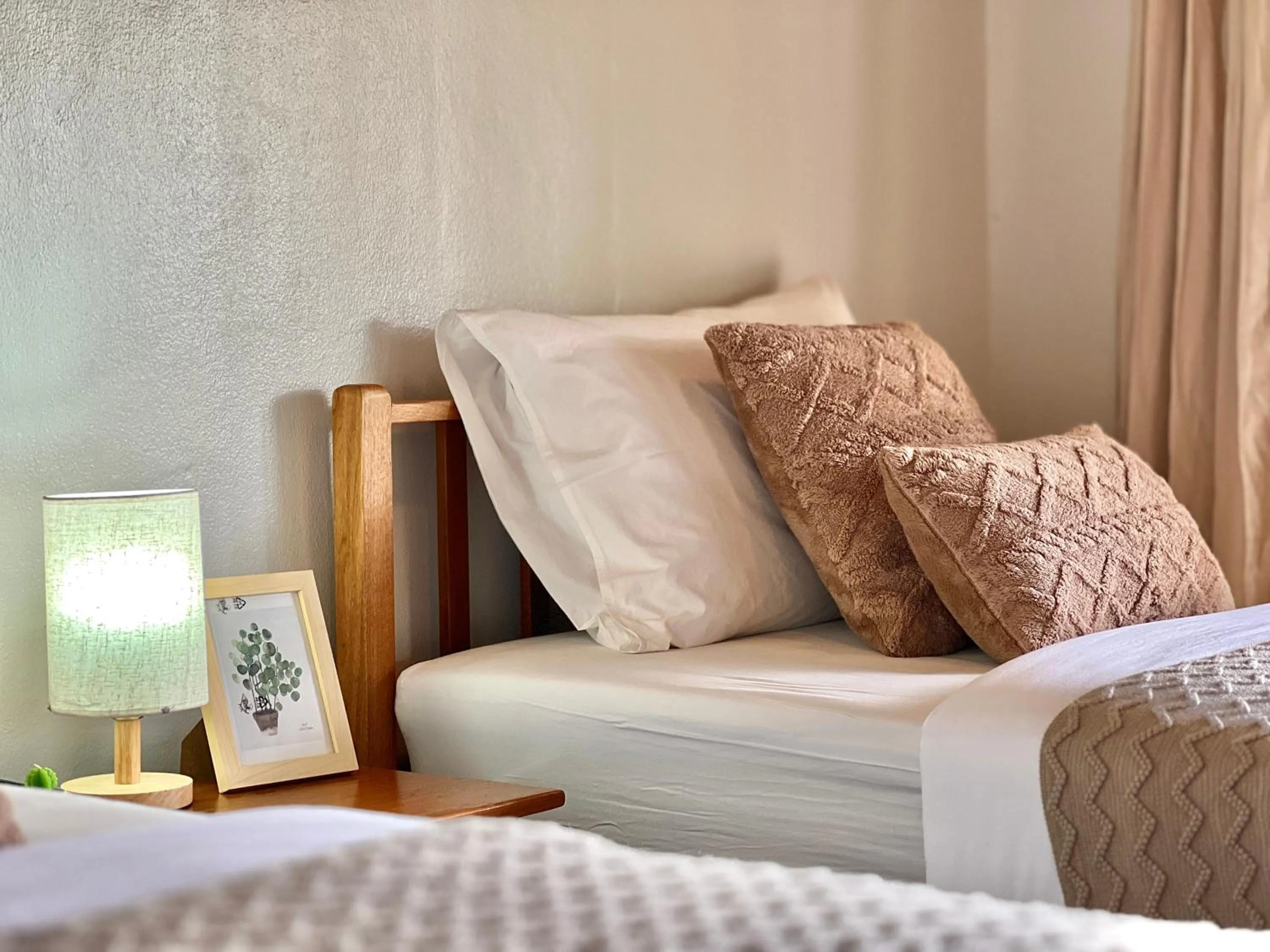 Bed in Baan Talay Resort & Yoga