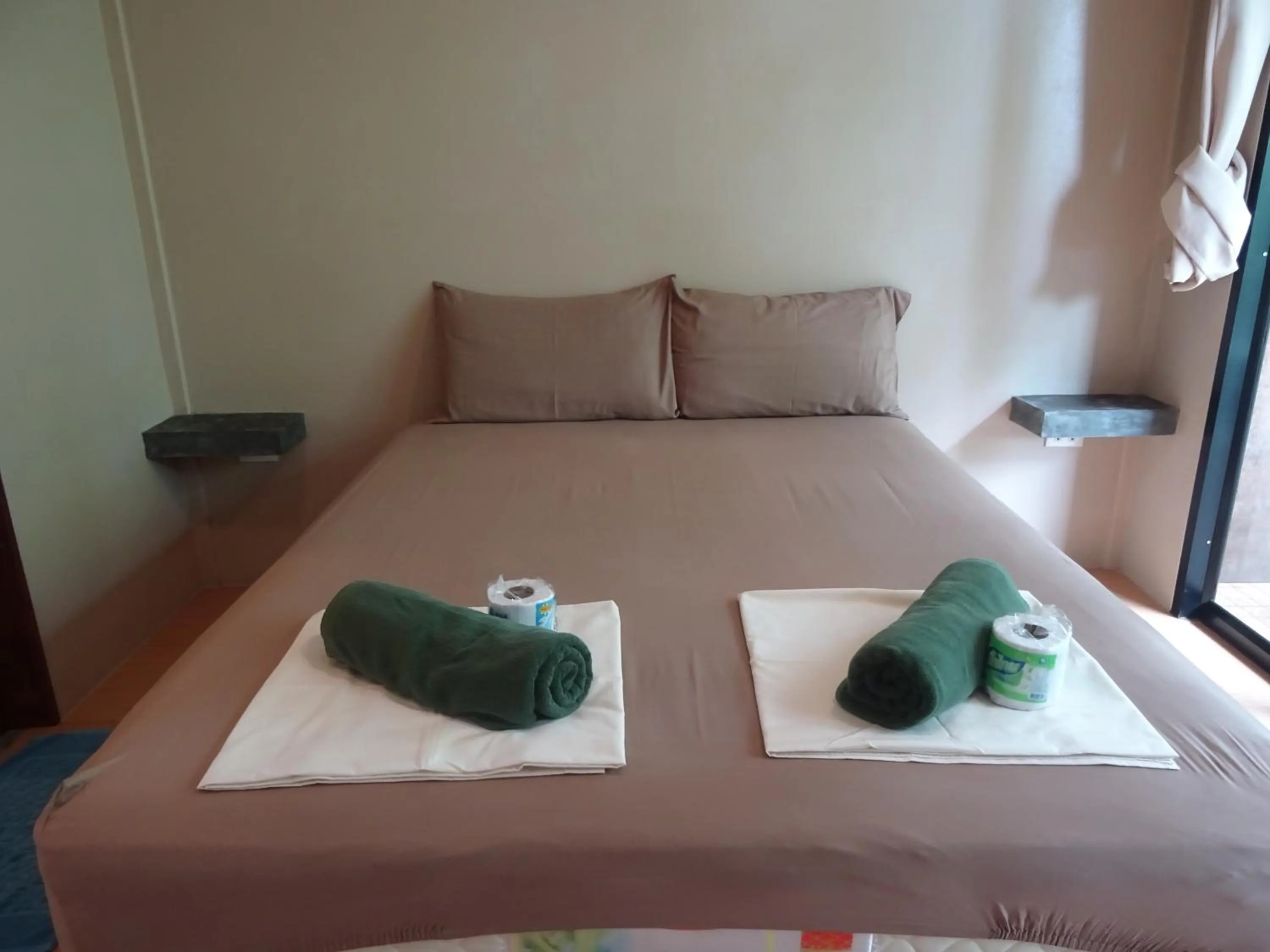 Bedroom in New Heaven Dive School and Resort