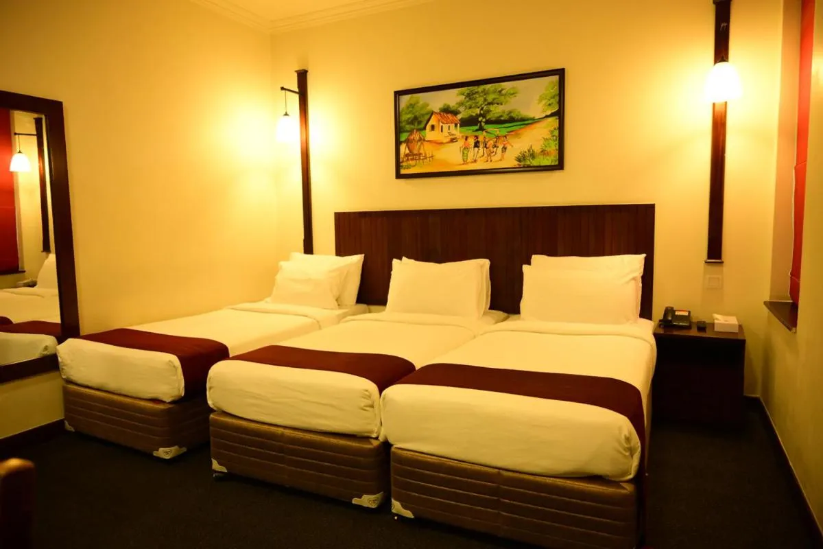 Bed in Hotel Nippon Colombo