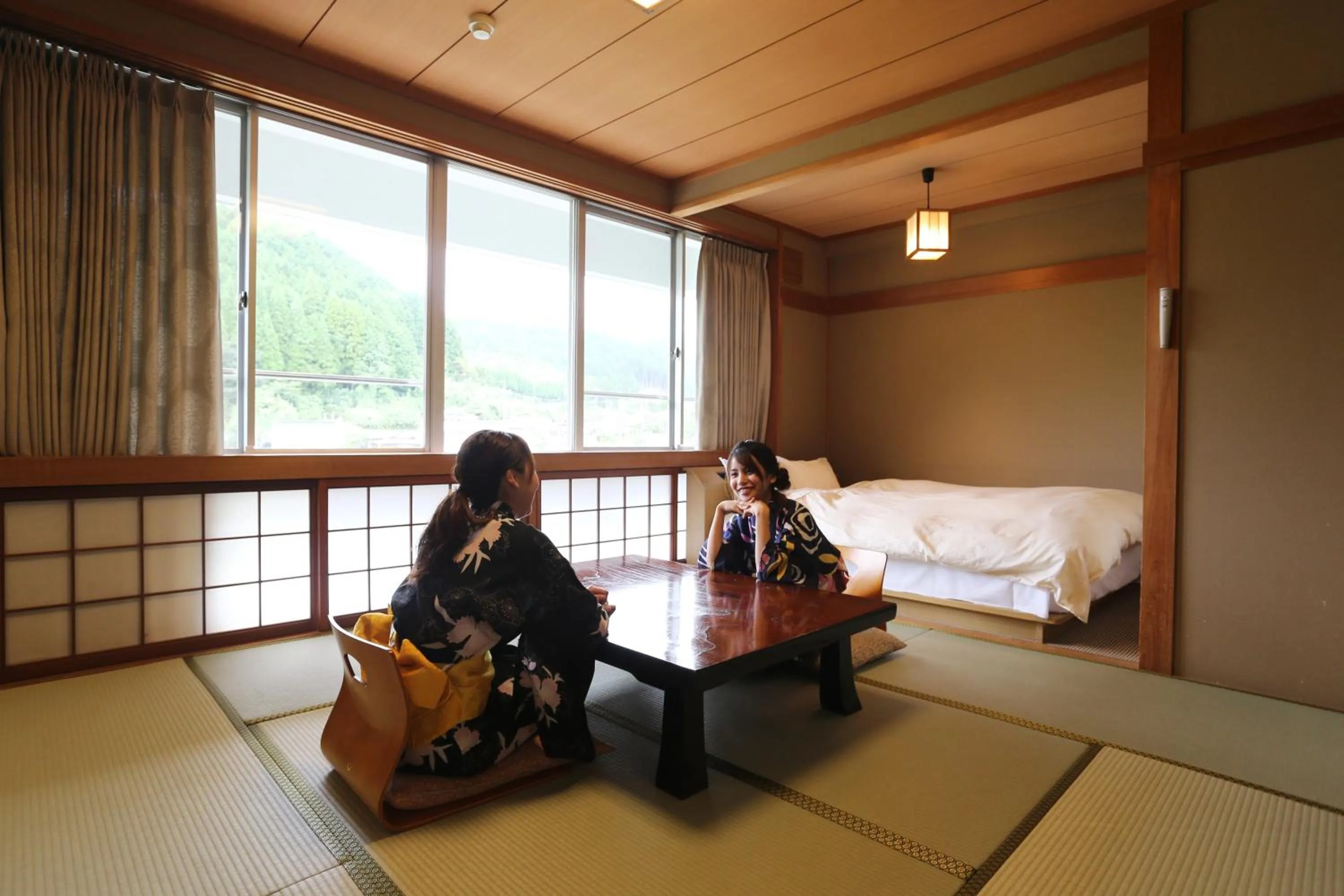 Photo of the whole room, Bed in Okutsu Onsen Komeya Club
