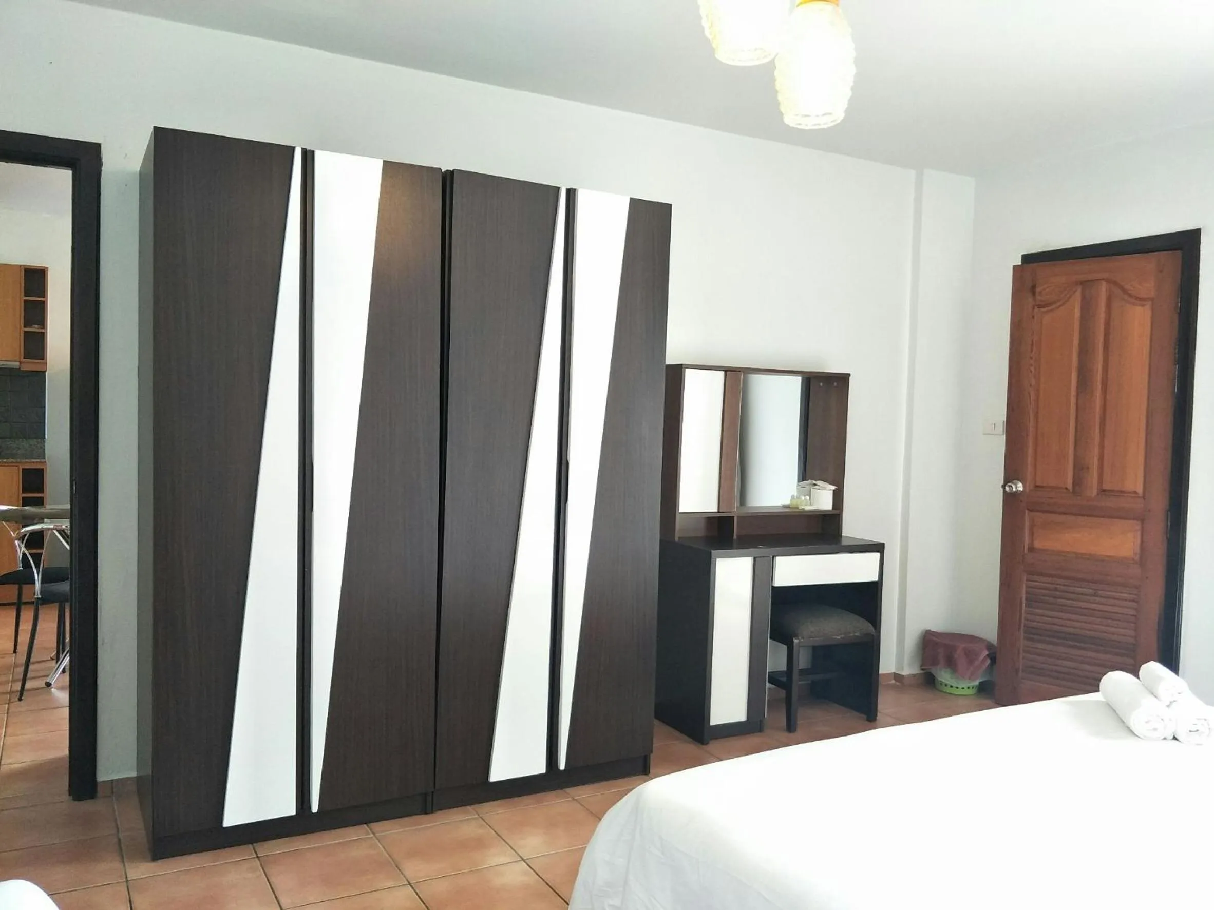 Decorative detail, Bed in Lomsabai Apartments