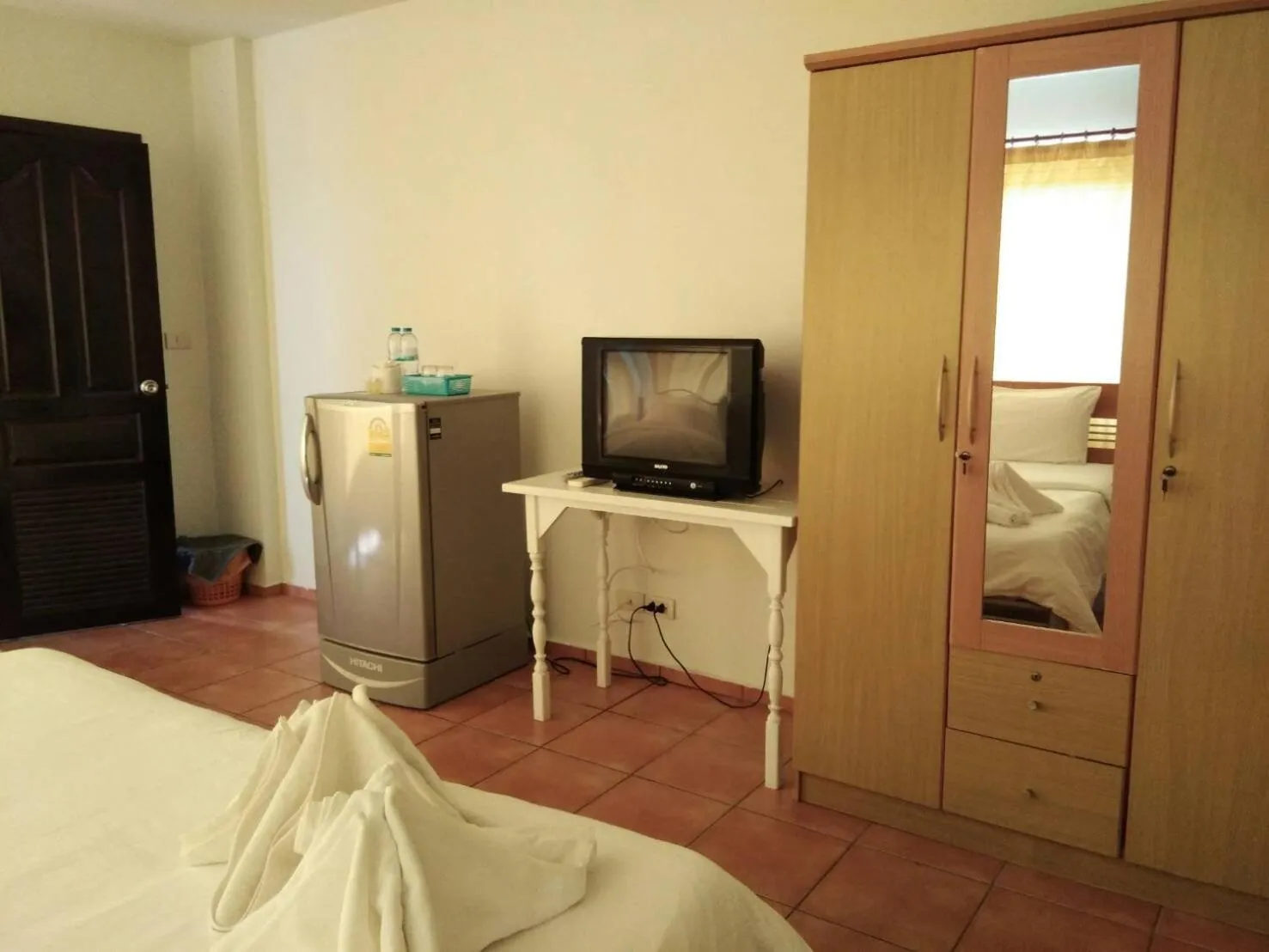 Decorative detail, Bed in Lomsabai Apartments