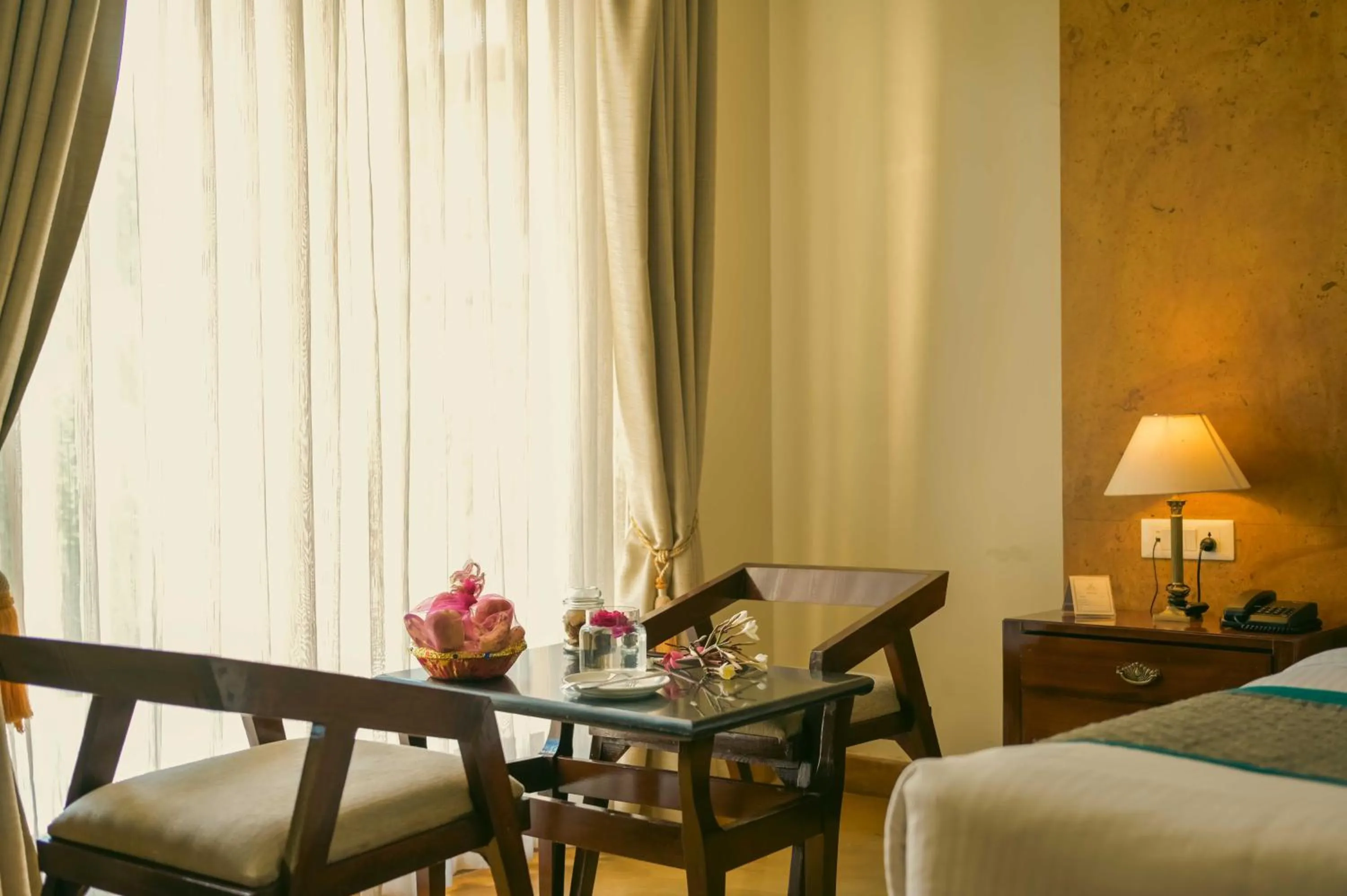 Dining area, Bed in Abhyaran Resort & Spa Ranthambore