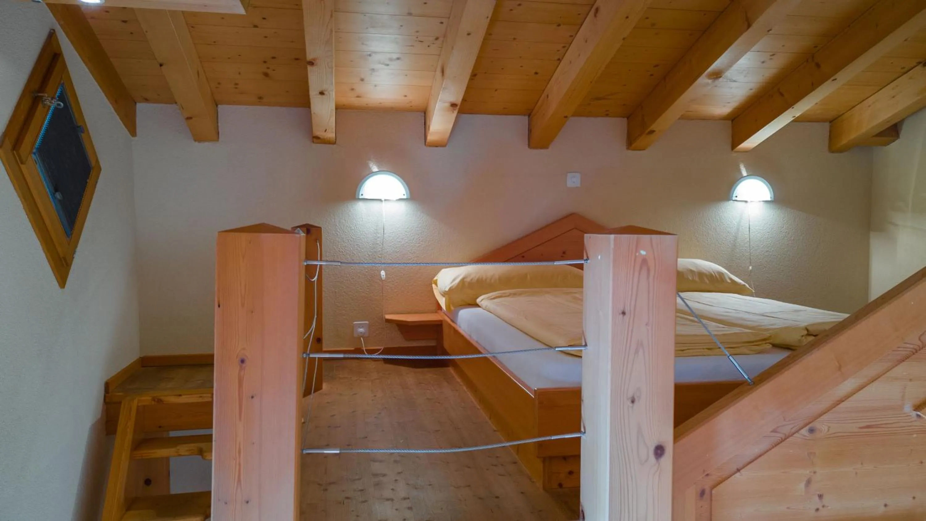 Bed in Hotel Central Wolter - Grindelwald