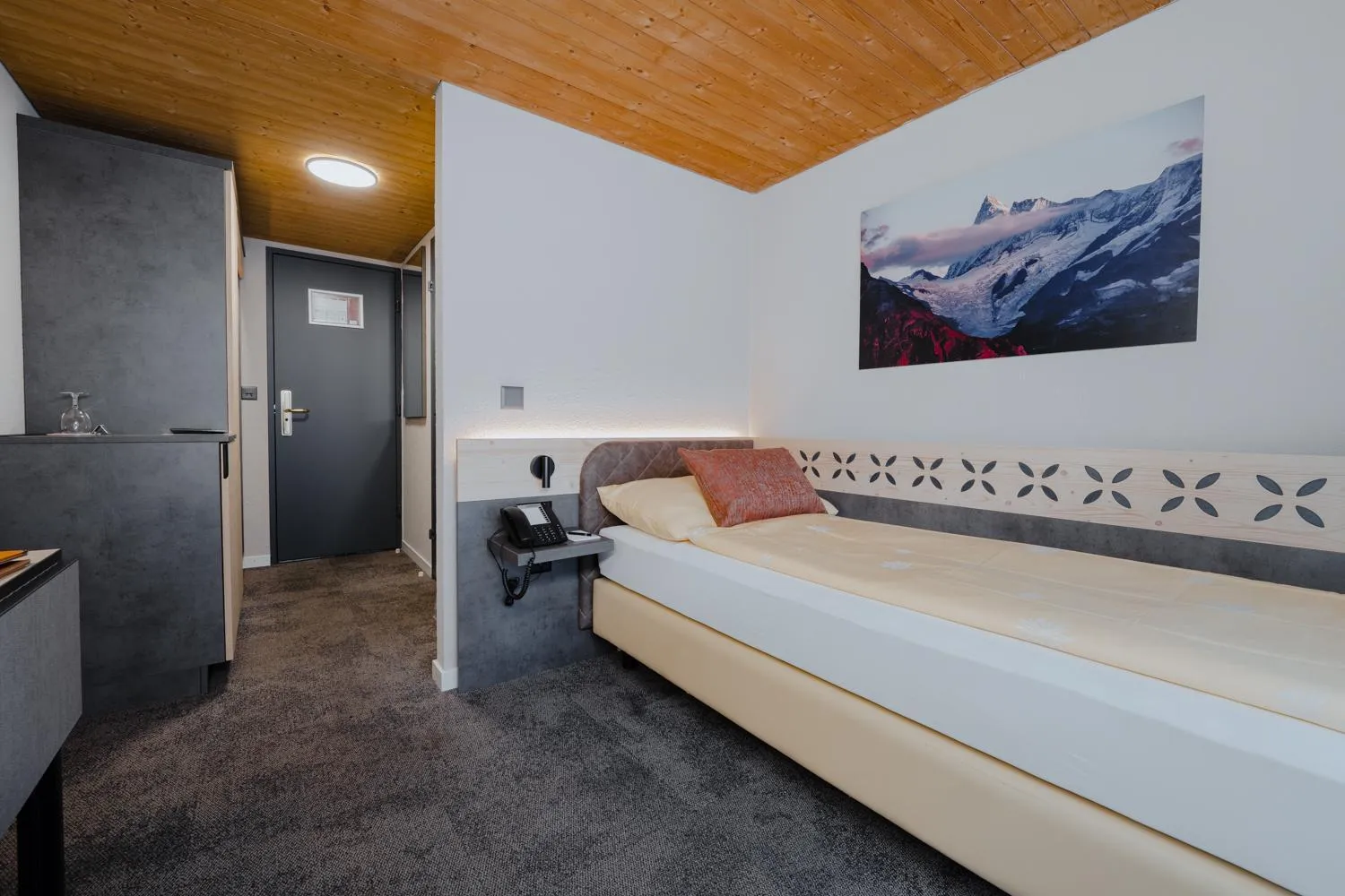 Bed in Hotel Central Wolter - Grindelwald