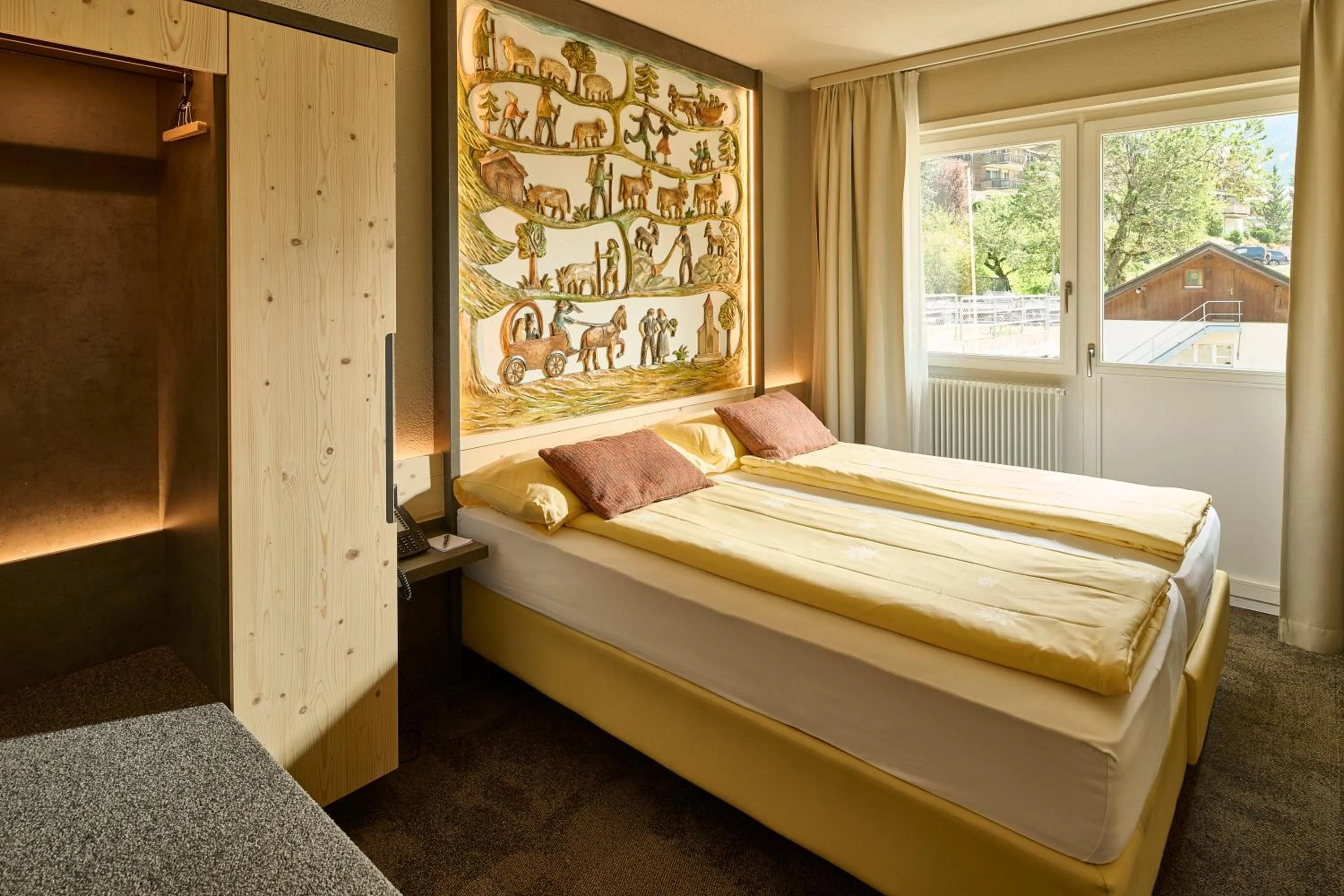 Photo of the whole room, Bed in Hotel Central Wolter - Grindelwald