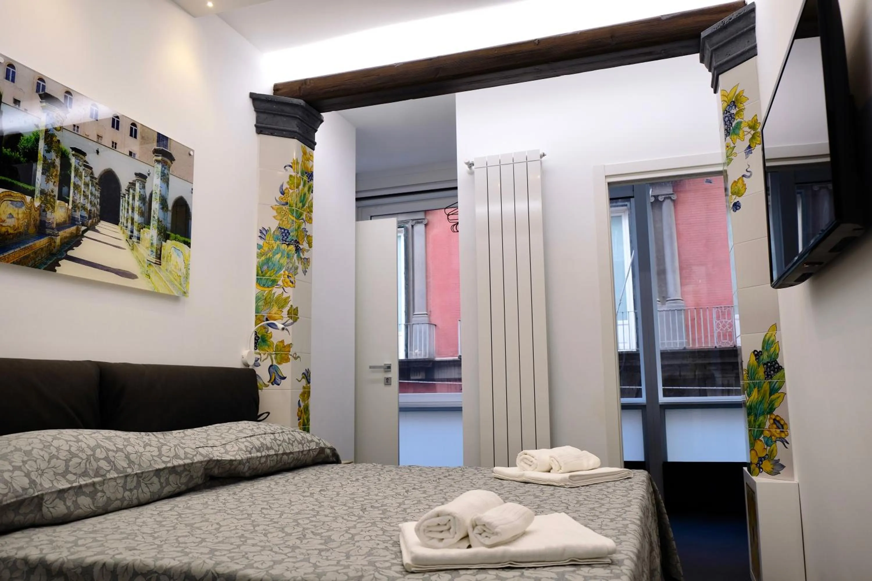 Bed in The Boutique Napoli Suite