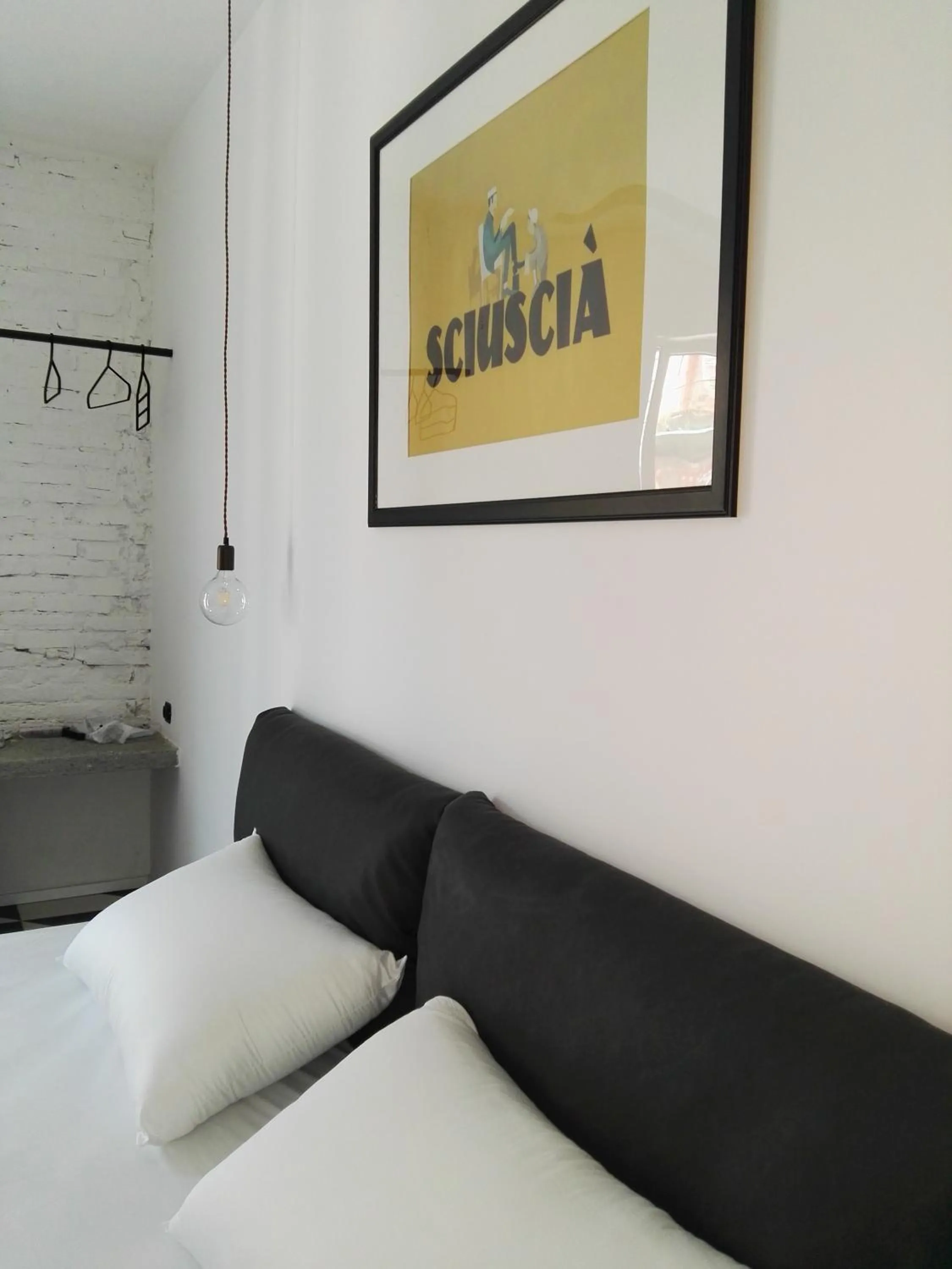 Bed in The Boutique Napoli Suite