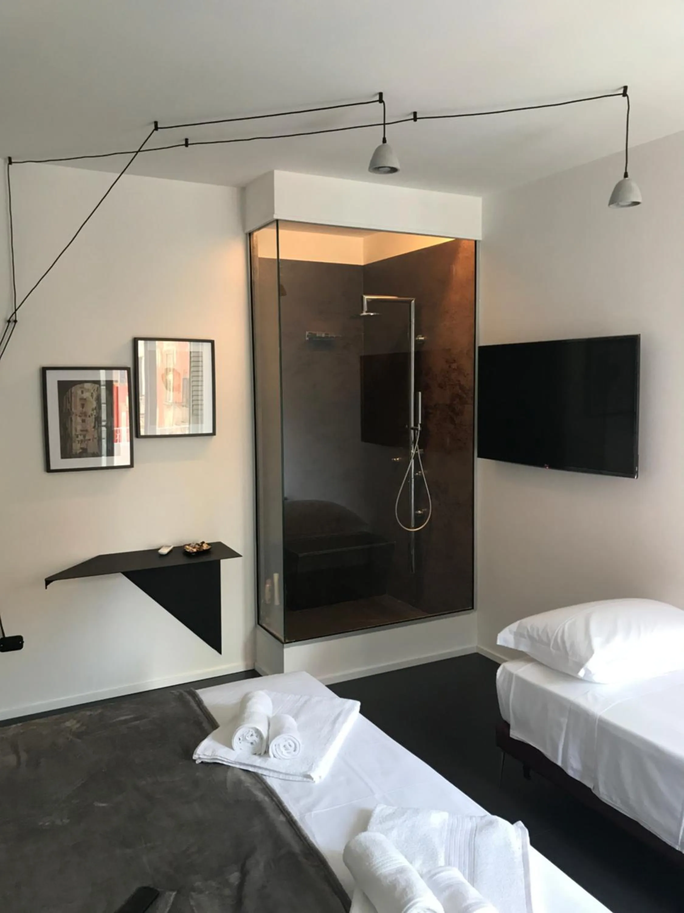 Bed in The Boutique Napoli Suite