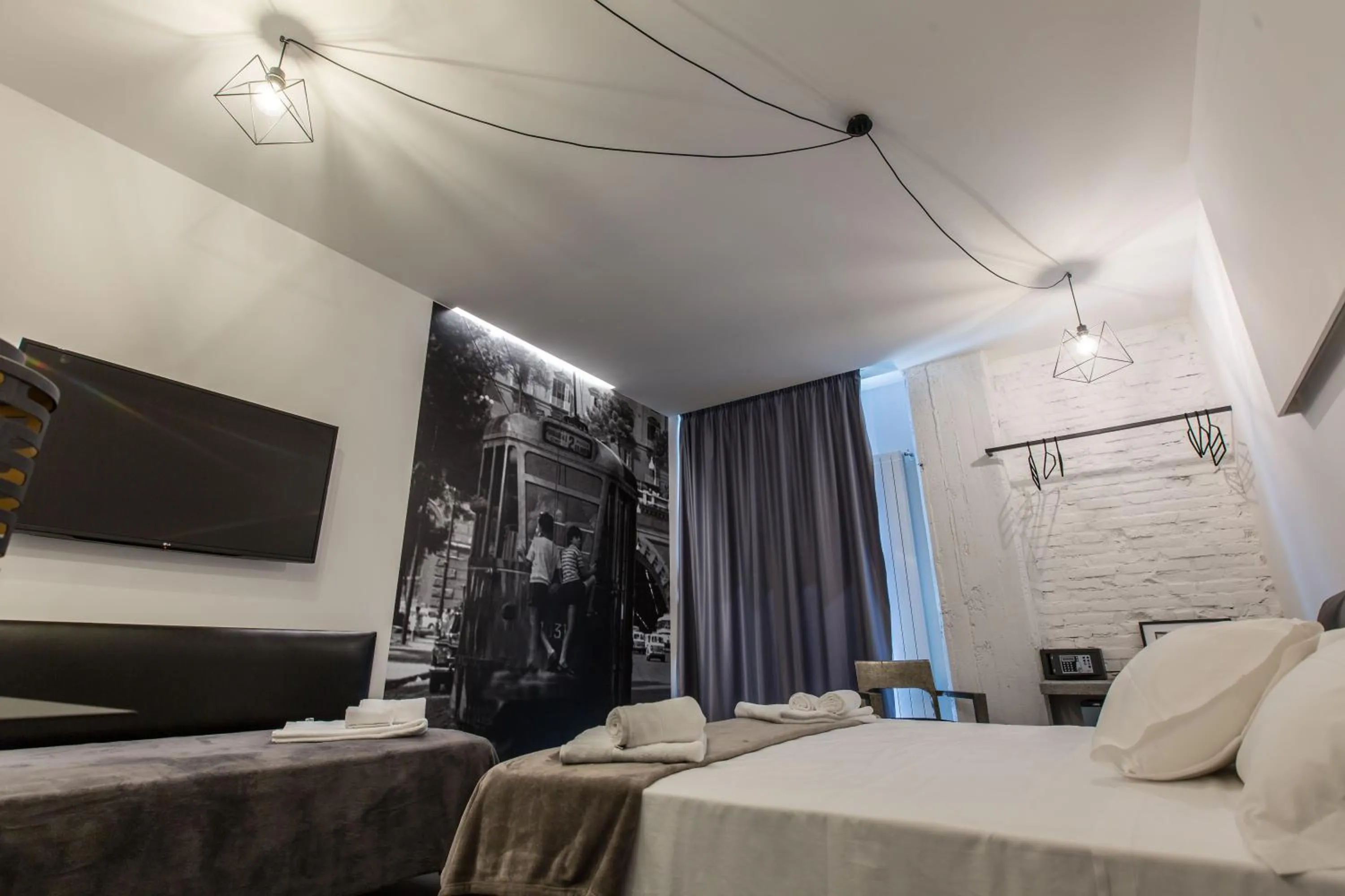 Bed in The Boutique Napoli Suite