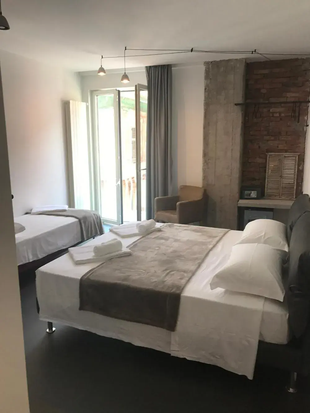 Deluxe Triple Room with Balcony - single occupancy in The Boutique Napoli Suite Deluxe Triple Room with Balcony - single occupancy in The Boutique Napoli Suite