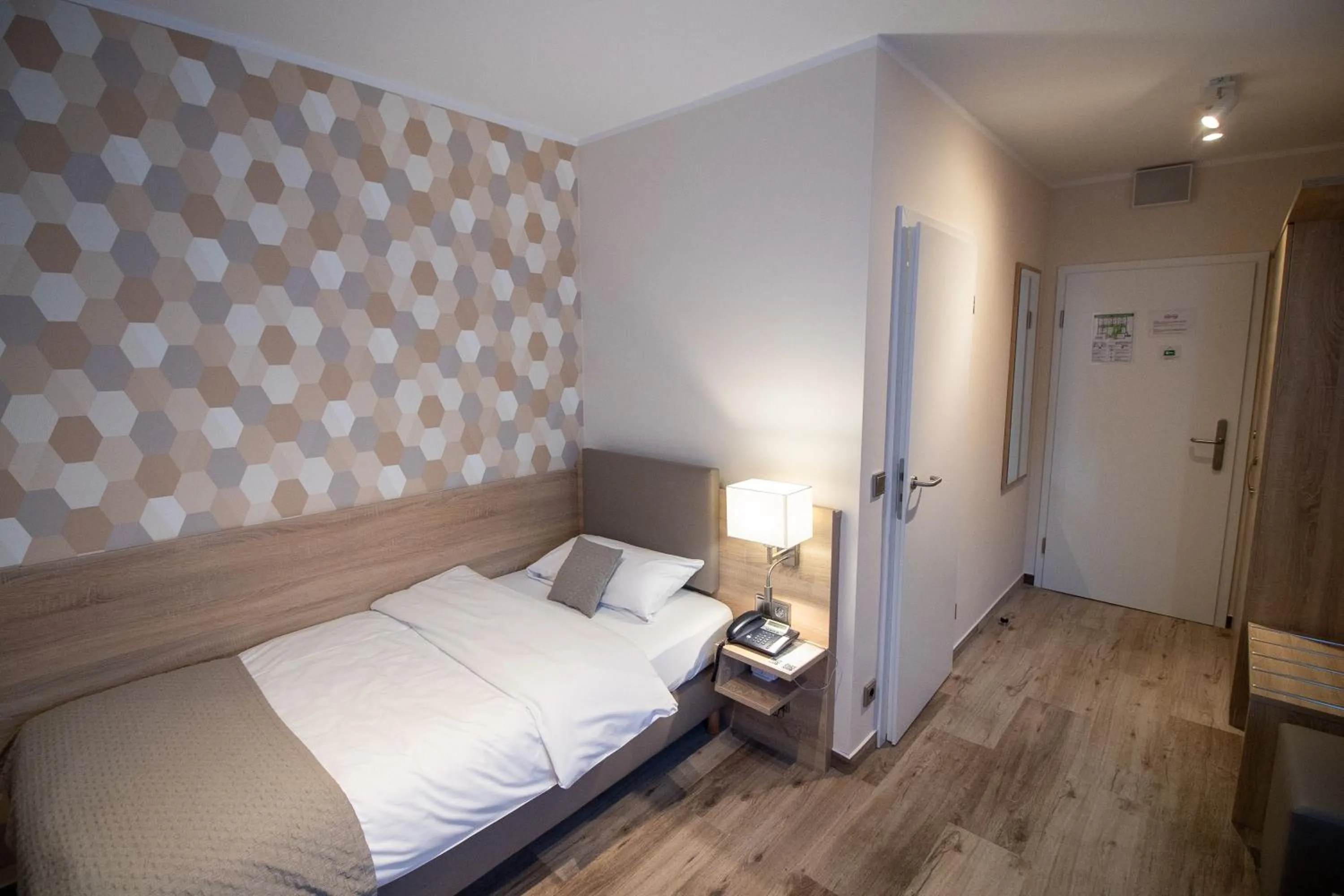 Photo of the whole room, Bed in Hotel Fallersleber Spieker