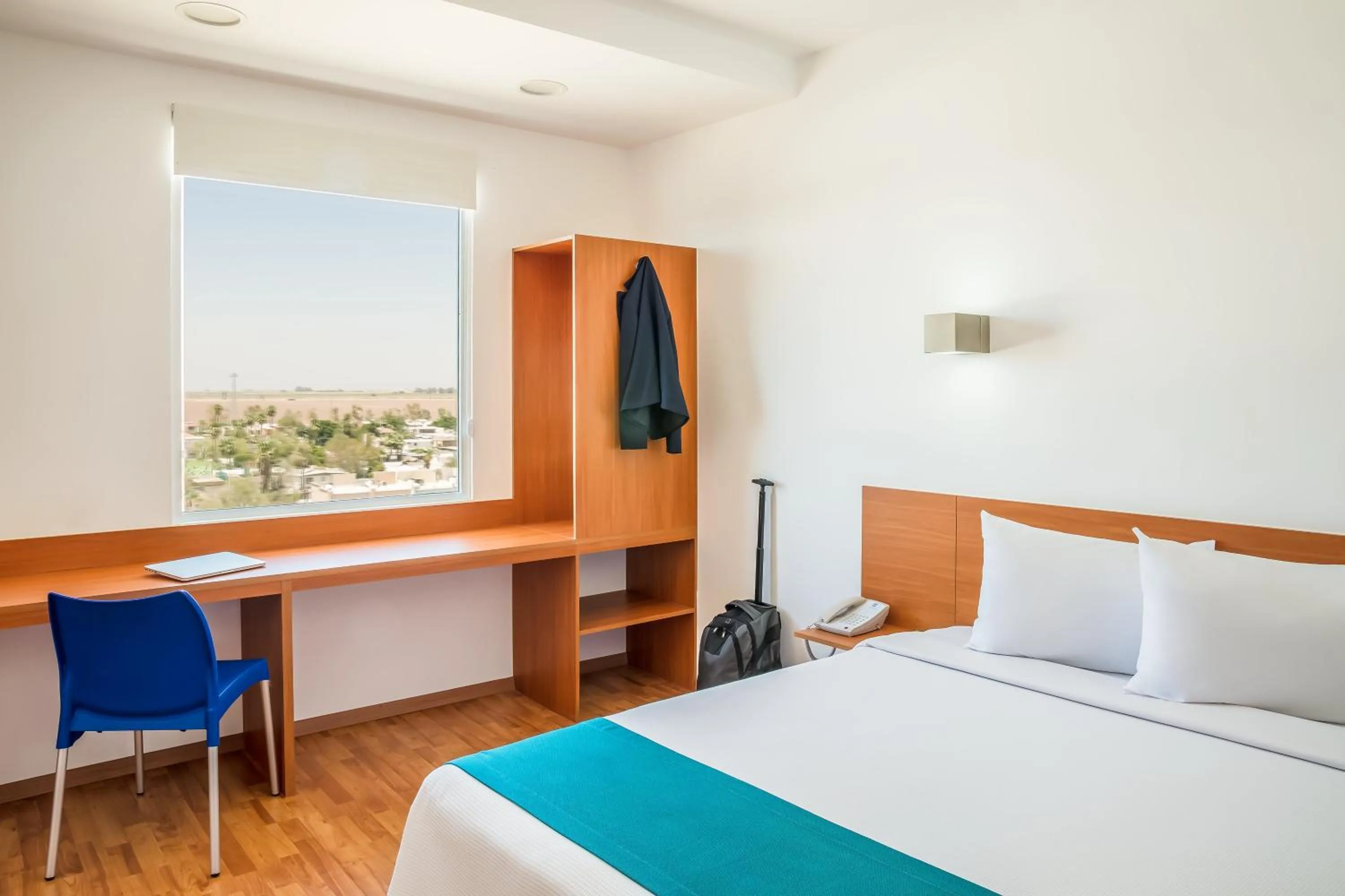 Photo of the whole room, Bed in One Mexicali