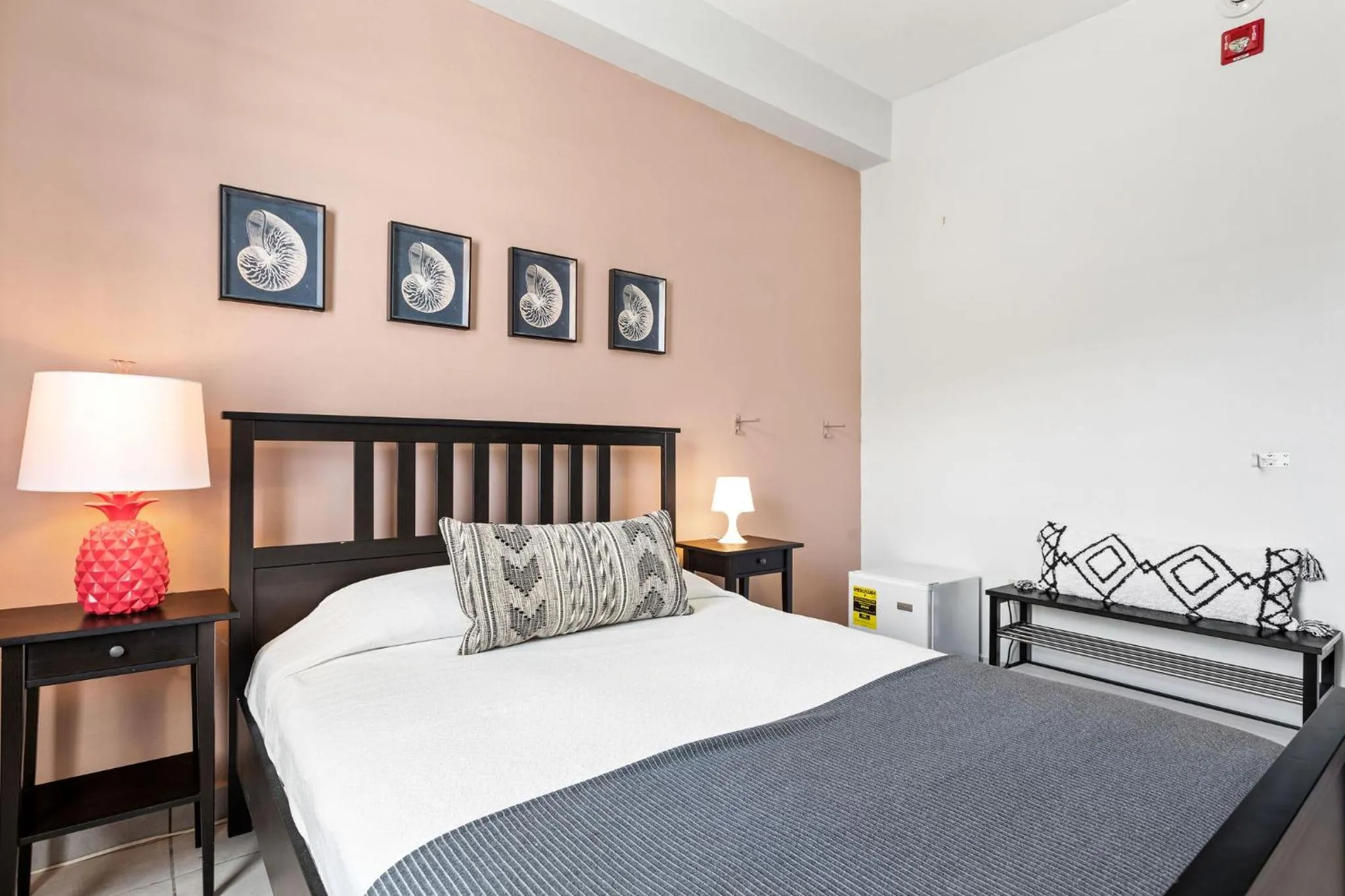 Bed in Rincon Plaza Hotel