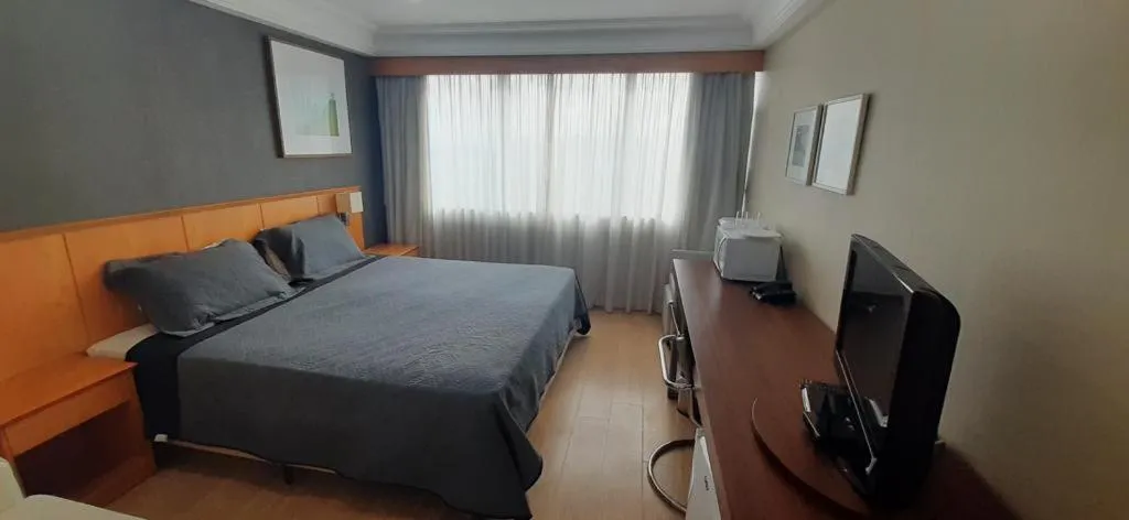 Bedroom, Bed in Mediterrâneo Flat - Apart-Hotel