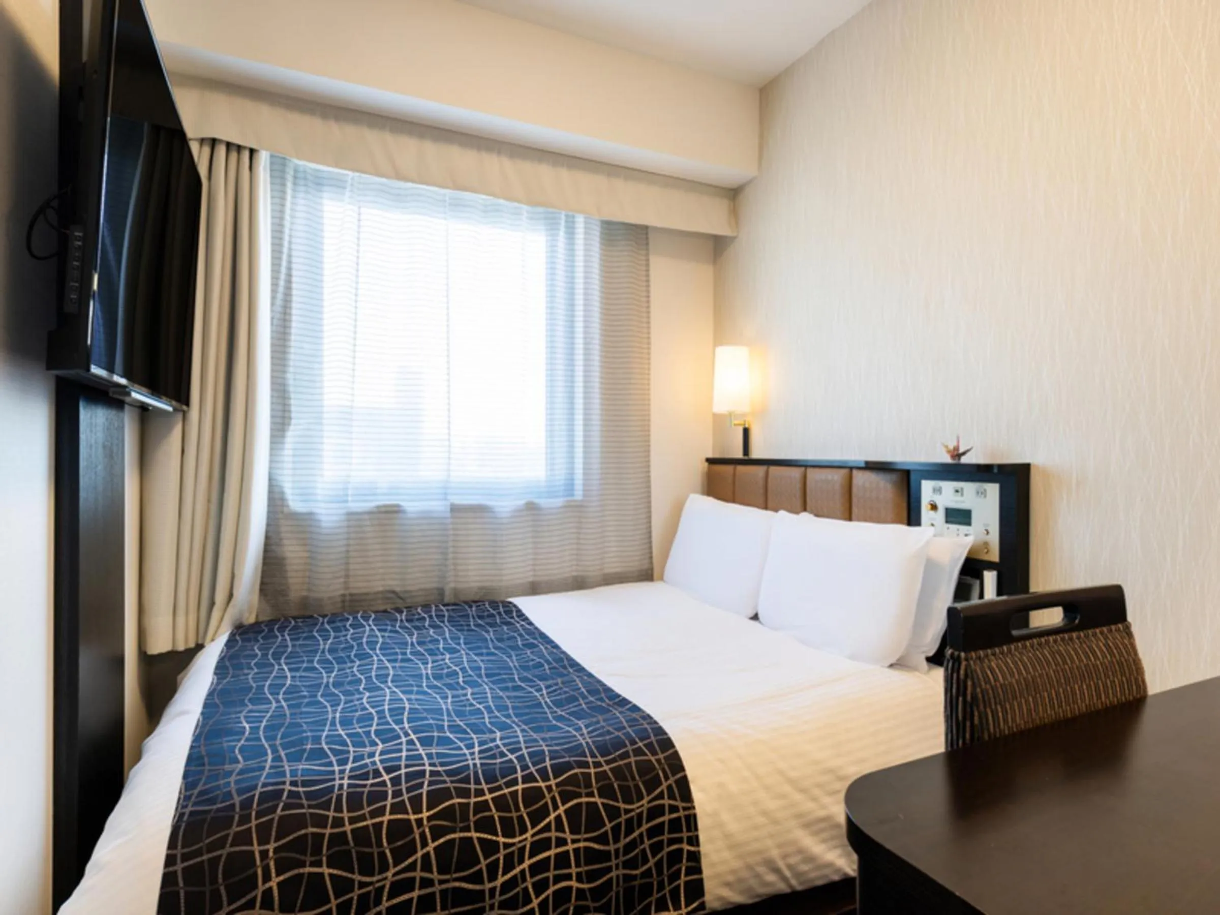 Photo of the whole room, Bed in APA Hotel Namba Ekihigashi