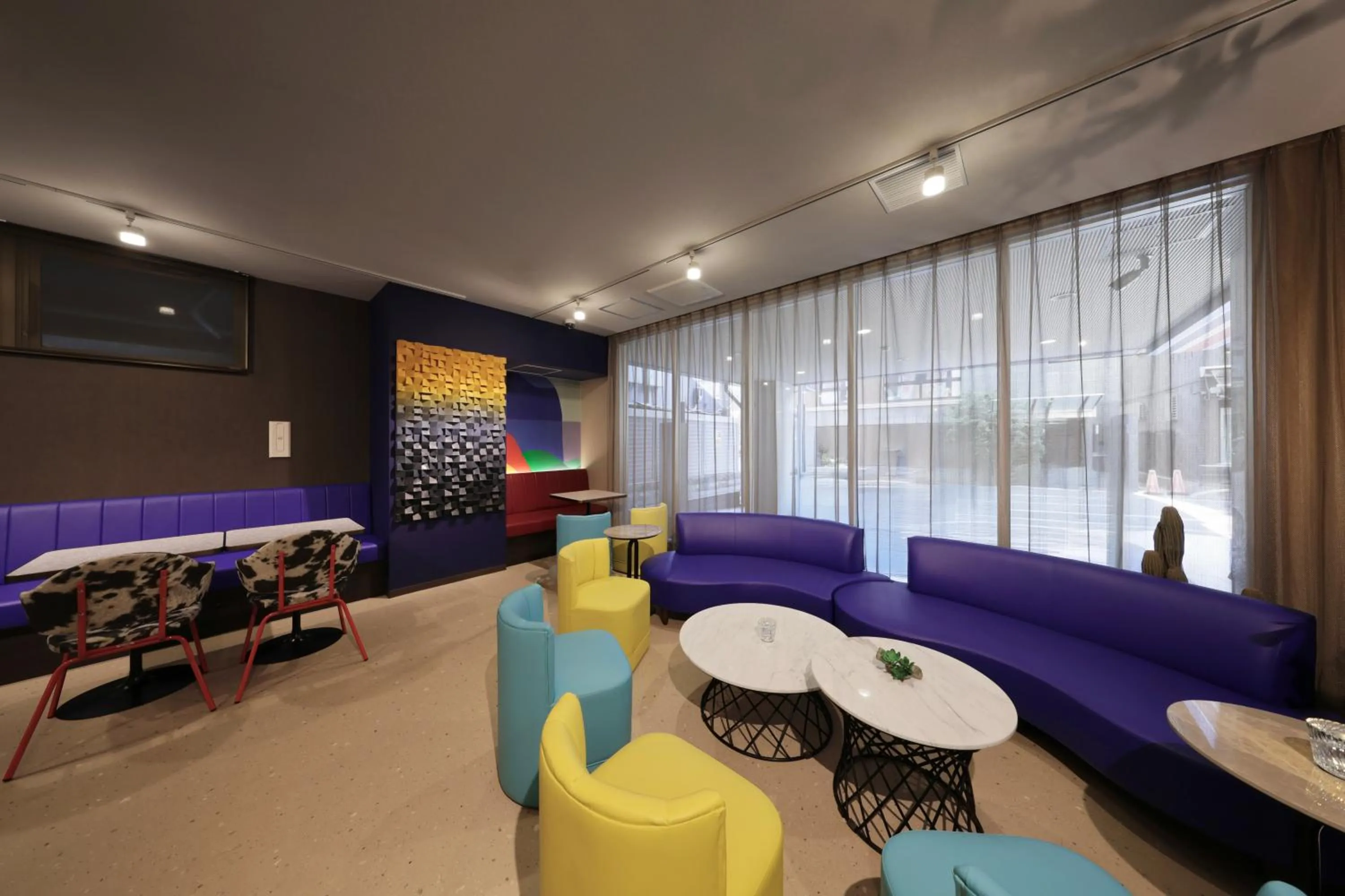 Communal lounge/ TV room in Nipponbashi Luxe Hotel