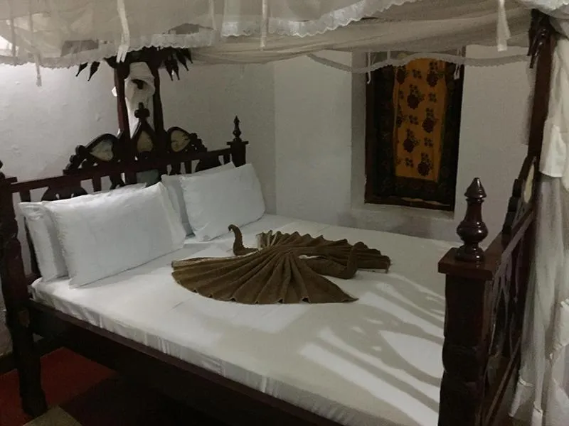 Bedroom in The Old Boma Hotel
