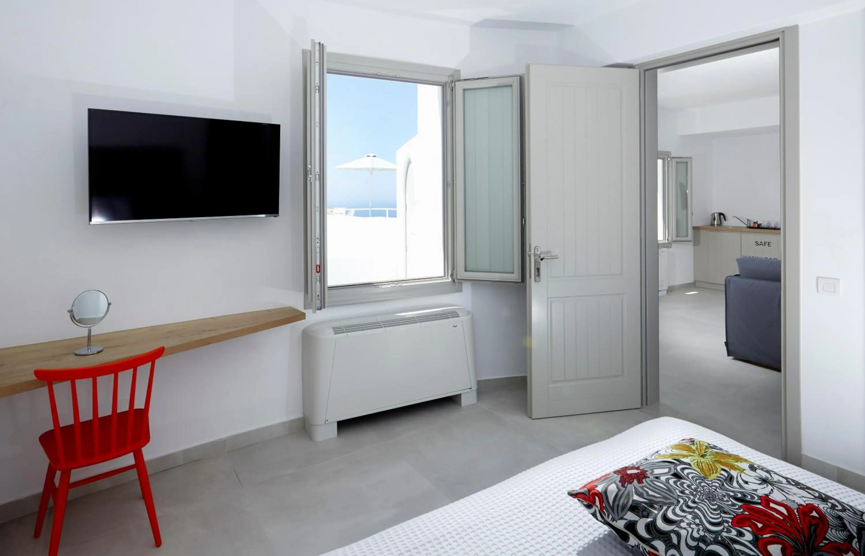 Bed in Aperanto Suites