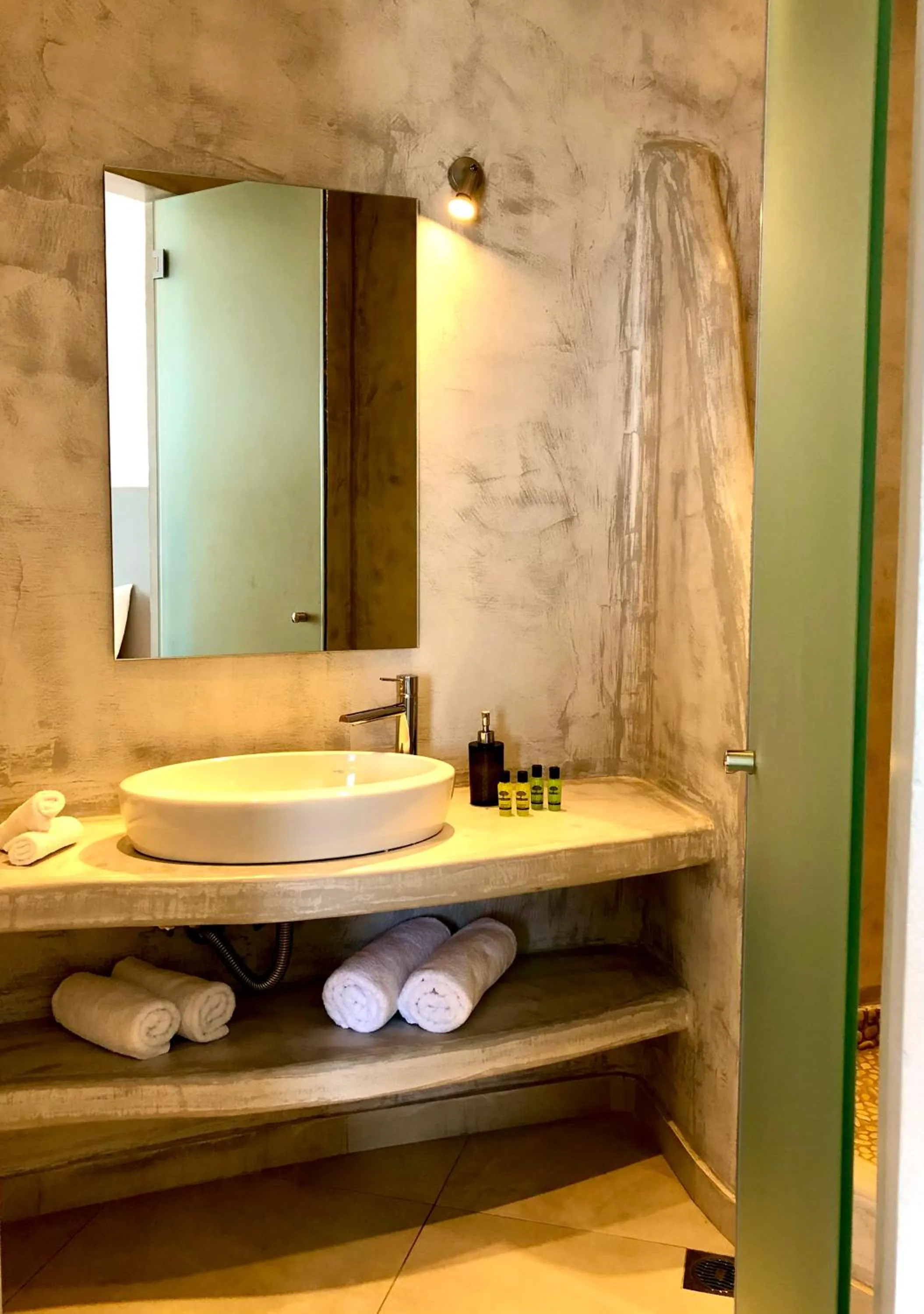 Bathroom in Aperanto Suites