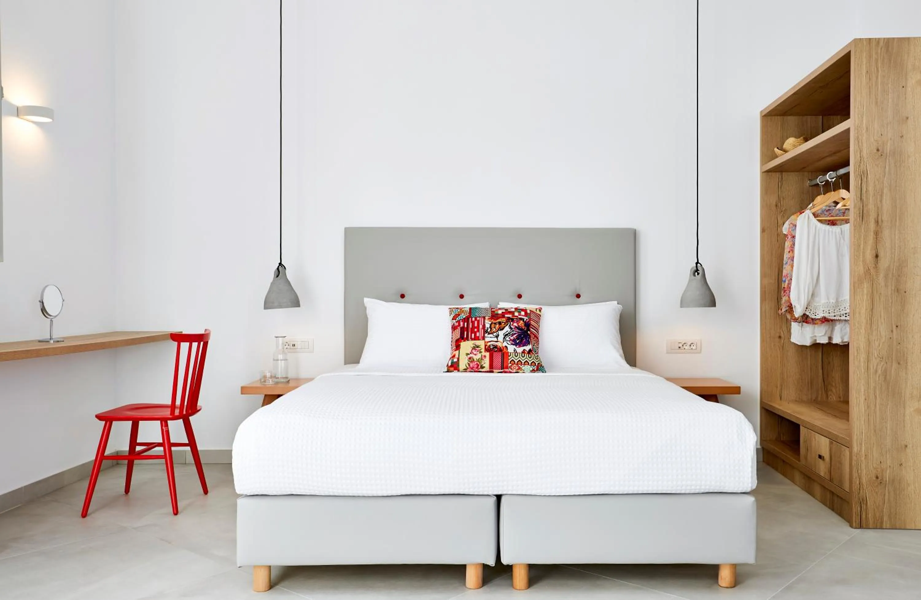 Bed in Aperanto Suites