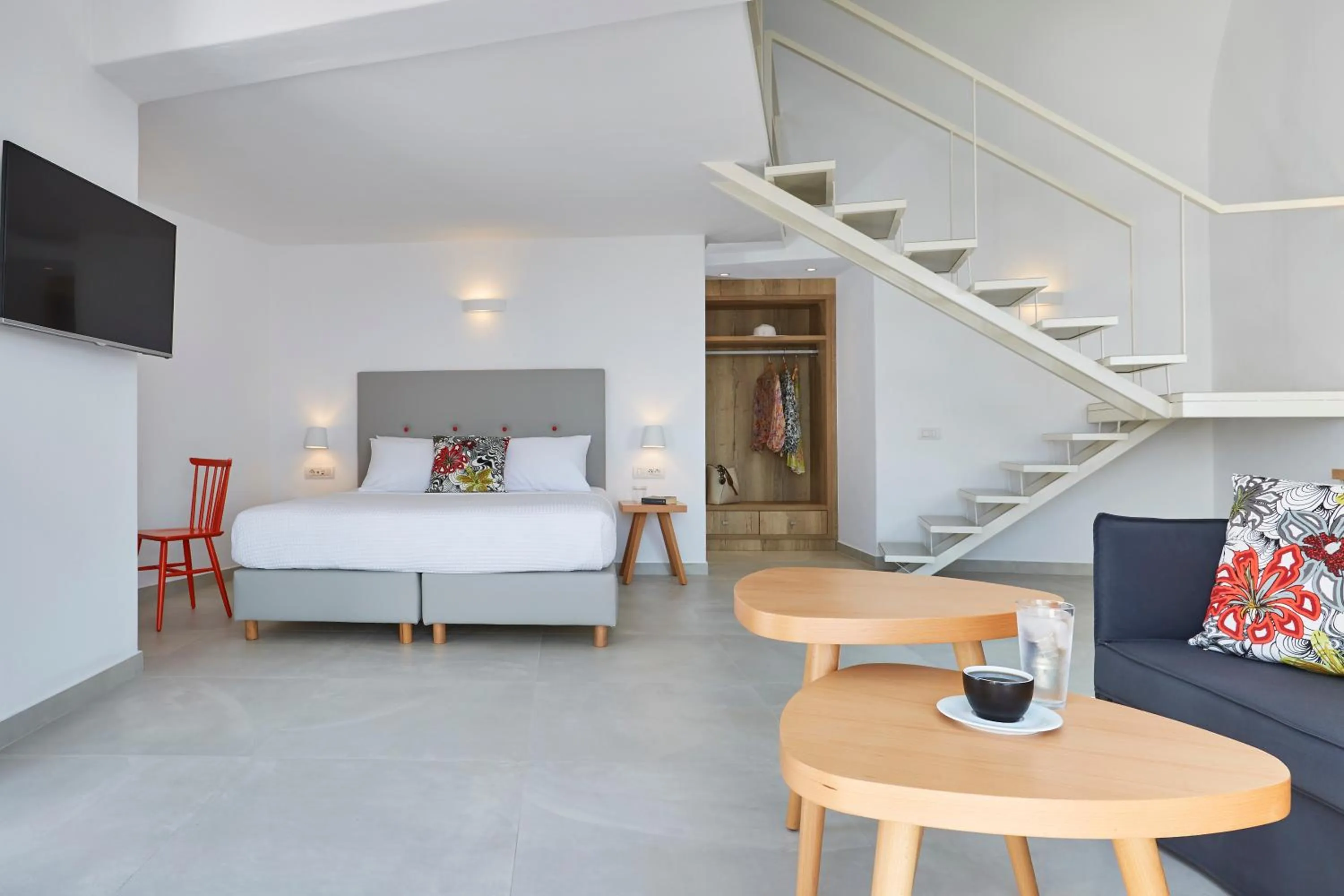 Bed in Aperanto Suites