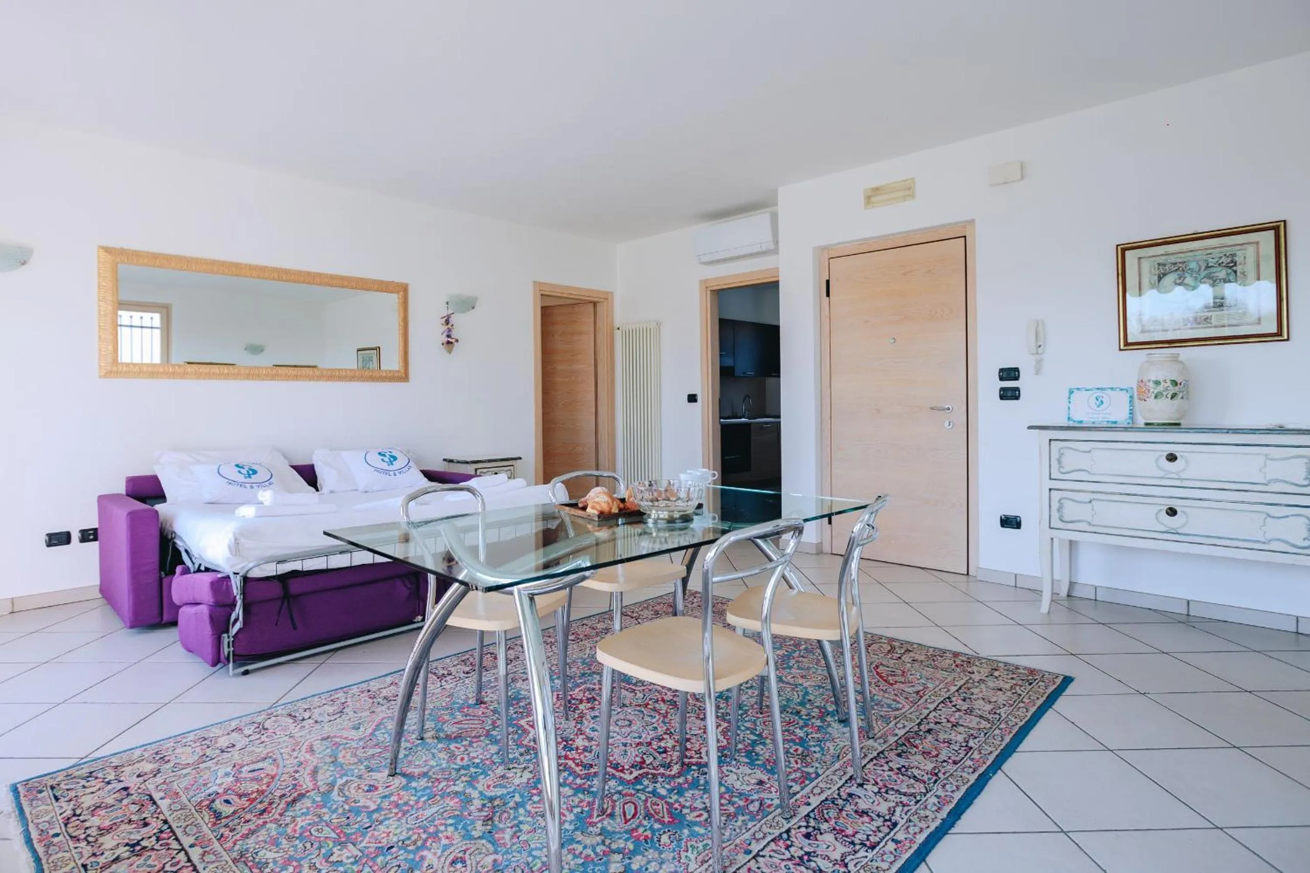 Communal lounge/ TV room in Residenza Pastrengo