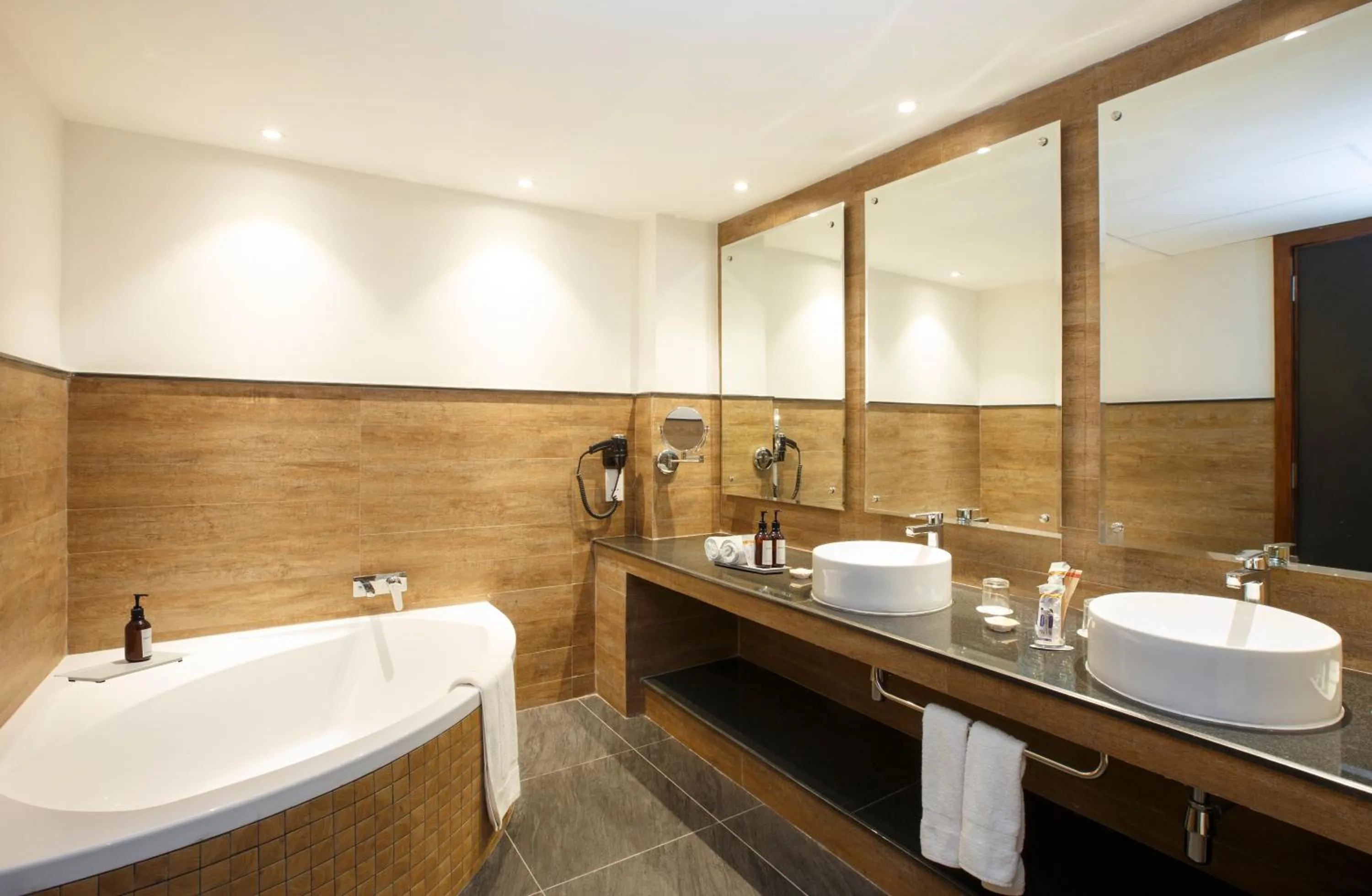 Bathroom in Hotel Ambassador by ACE Hotels
