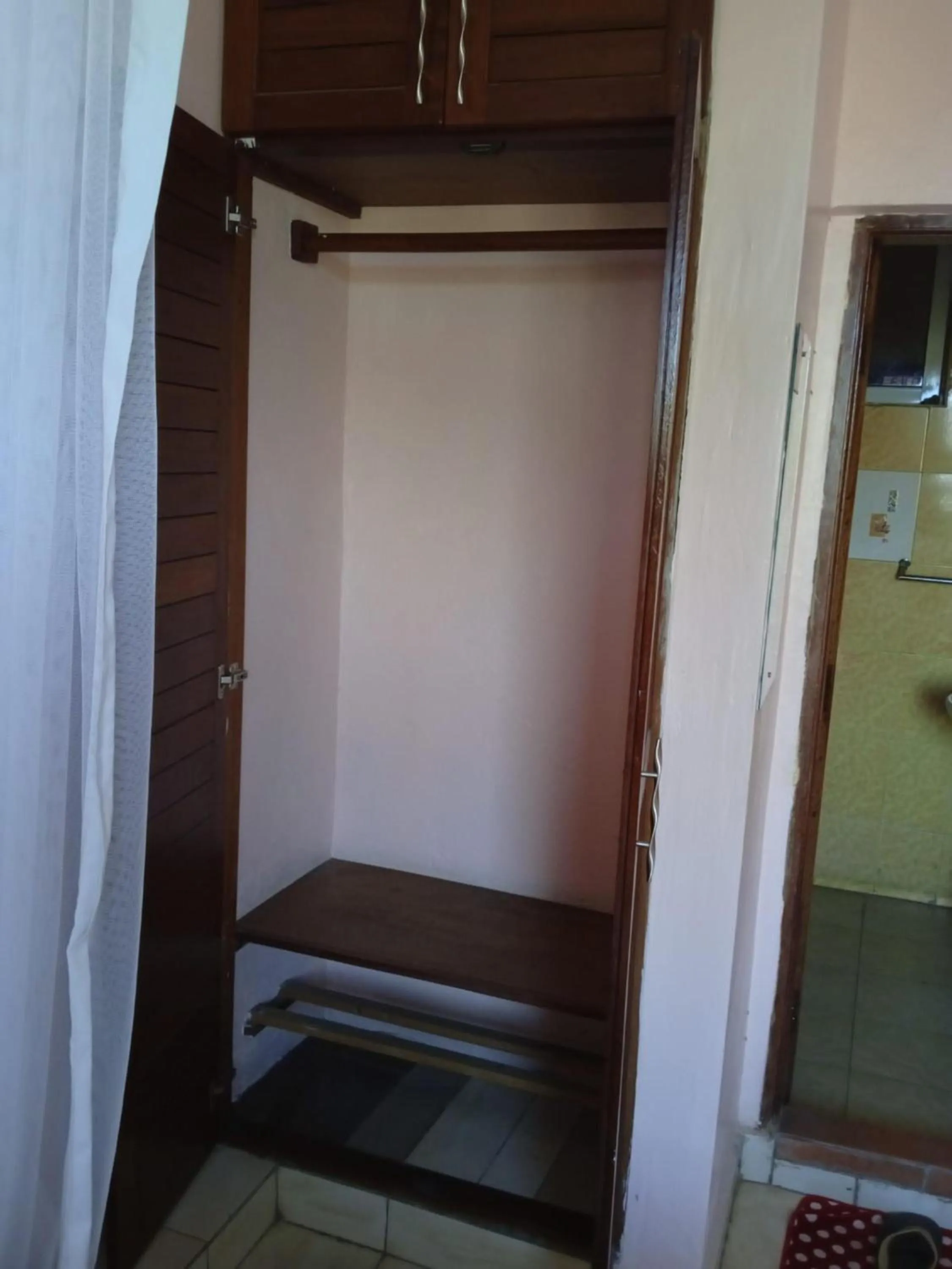 wardrobe in Checkpoint Inn Hotel, Mombasa