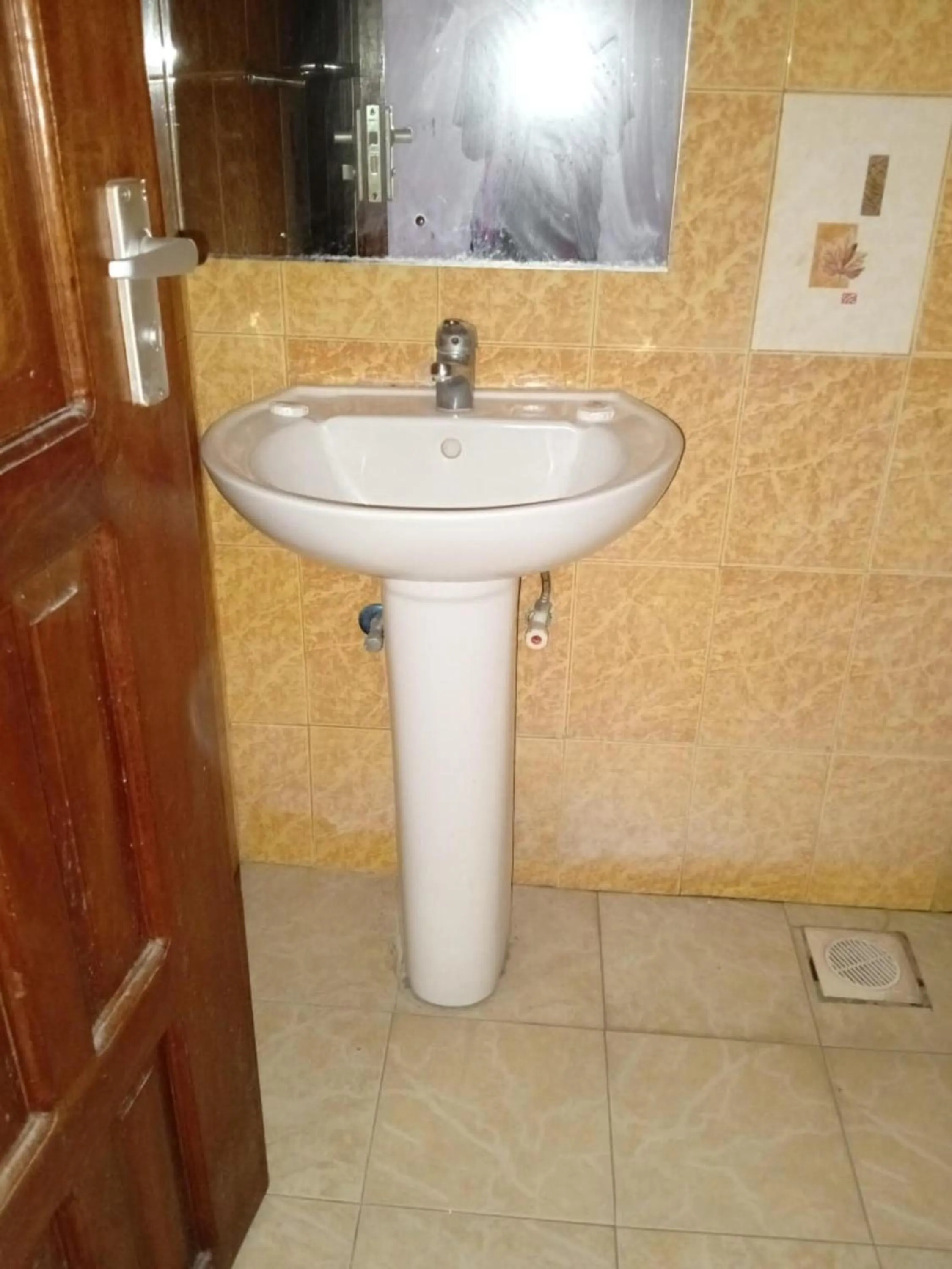 Bathroom in Checkpoint Inn Hotel, Mombasa