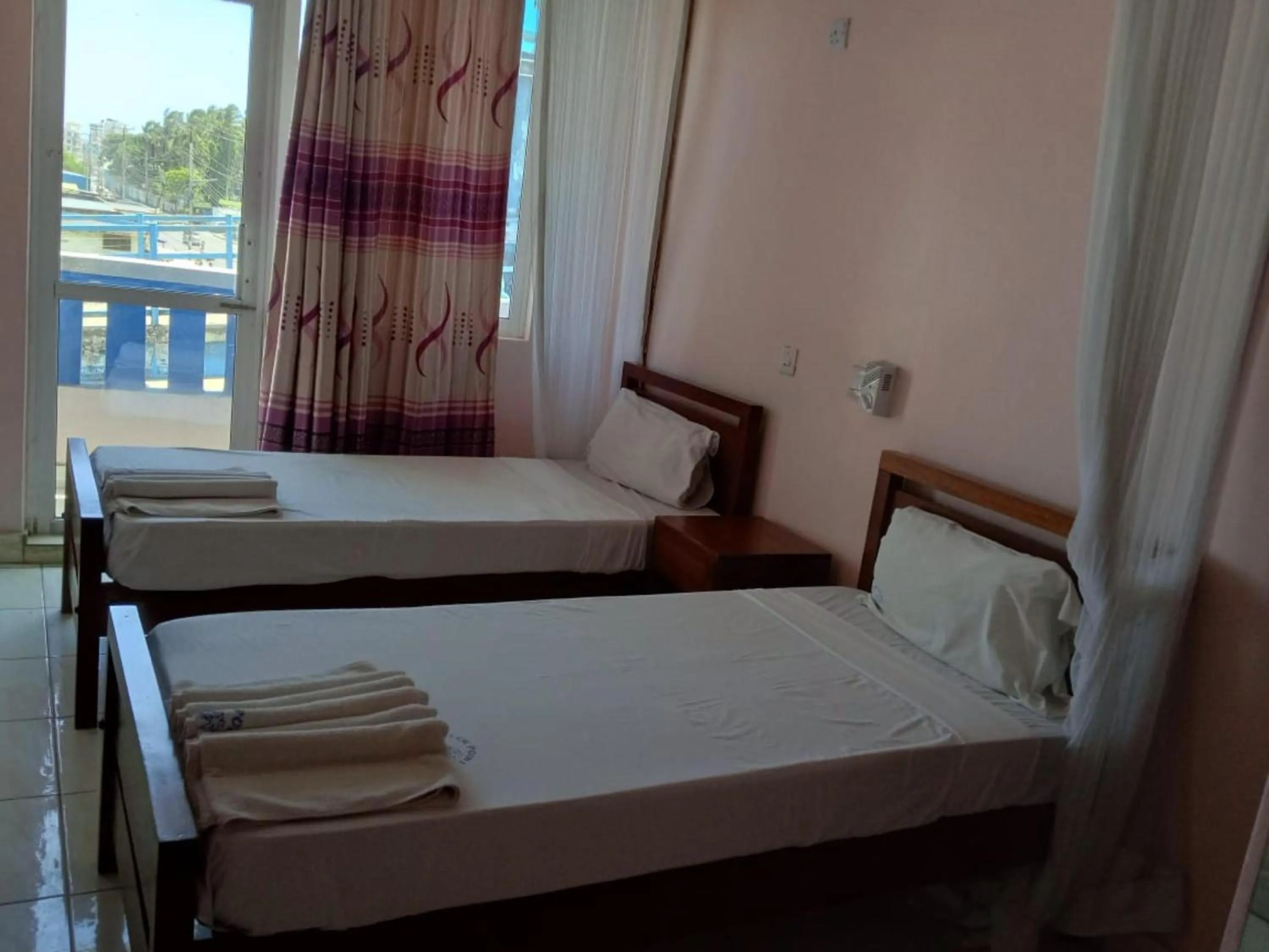 Bed in Checkpoint Inn Hotel, Mombasa