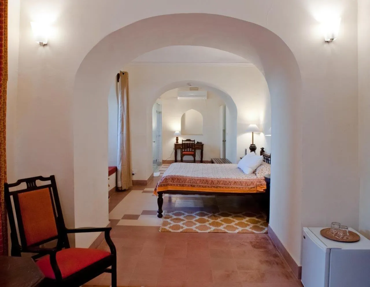 Seating area, Bed in Neemrana's - Tijara Fort Palace