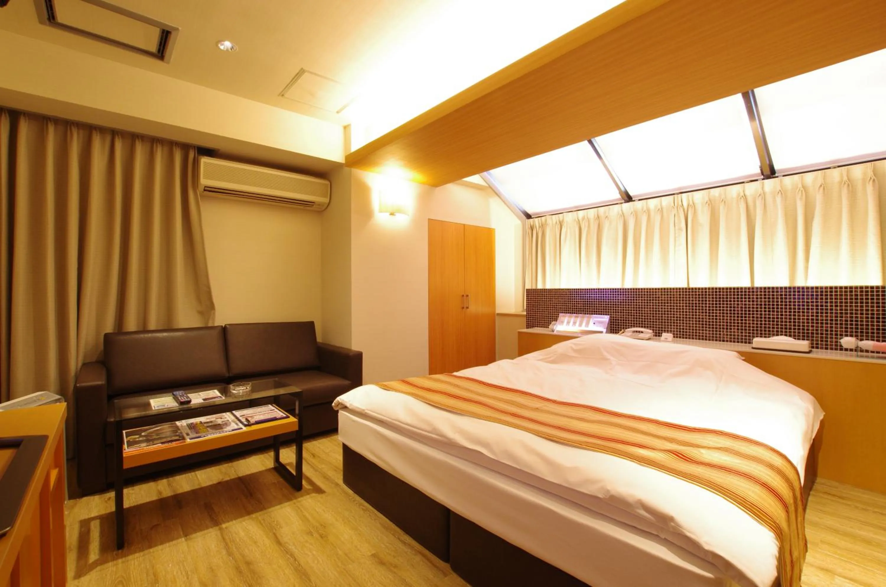 Photo of the whole room, Bed in BlueHotel sju(:)pri:m (Adult Only)