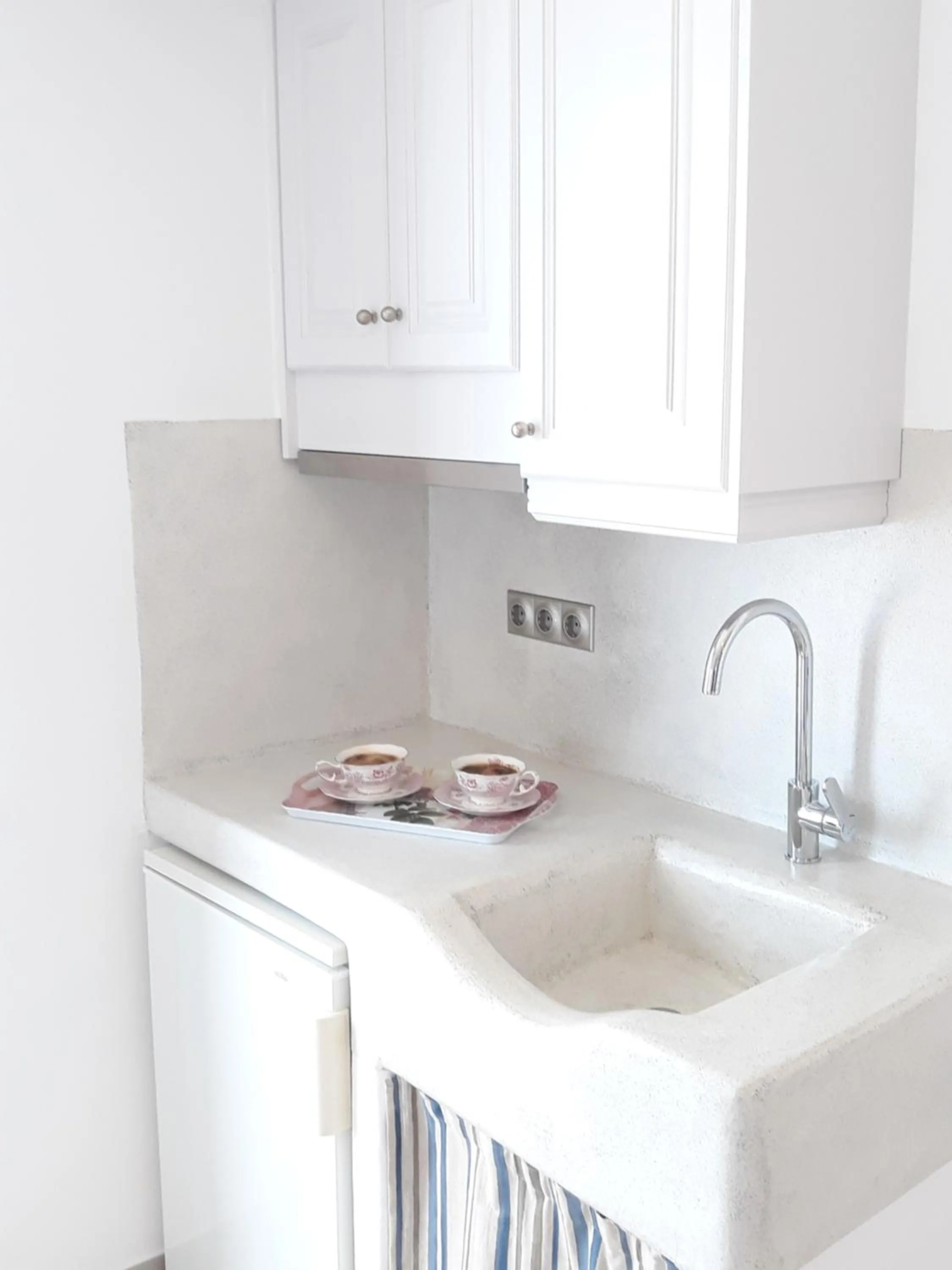 Kitchen or kitchenette in Nikos Apartments and Studios