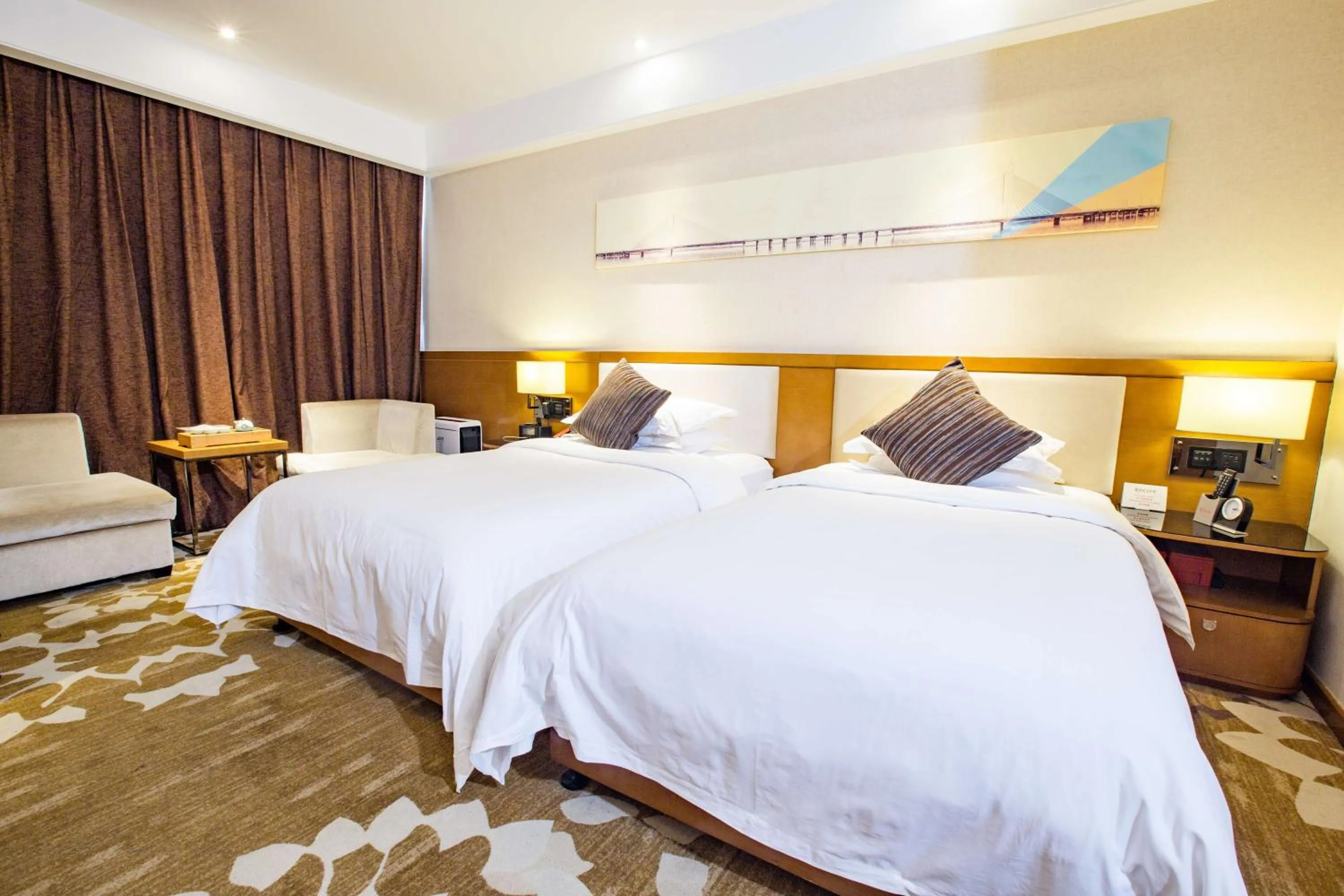 Bed in Ramada Encore Wuhan