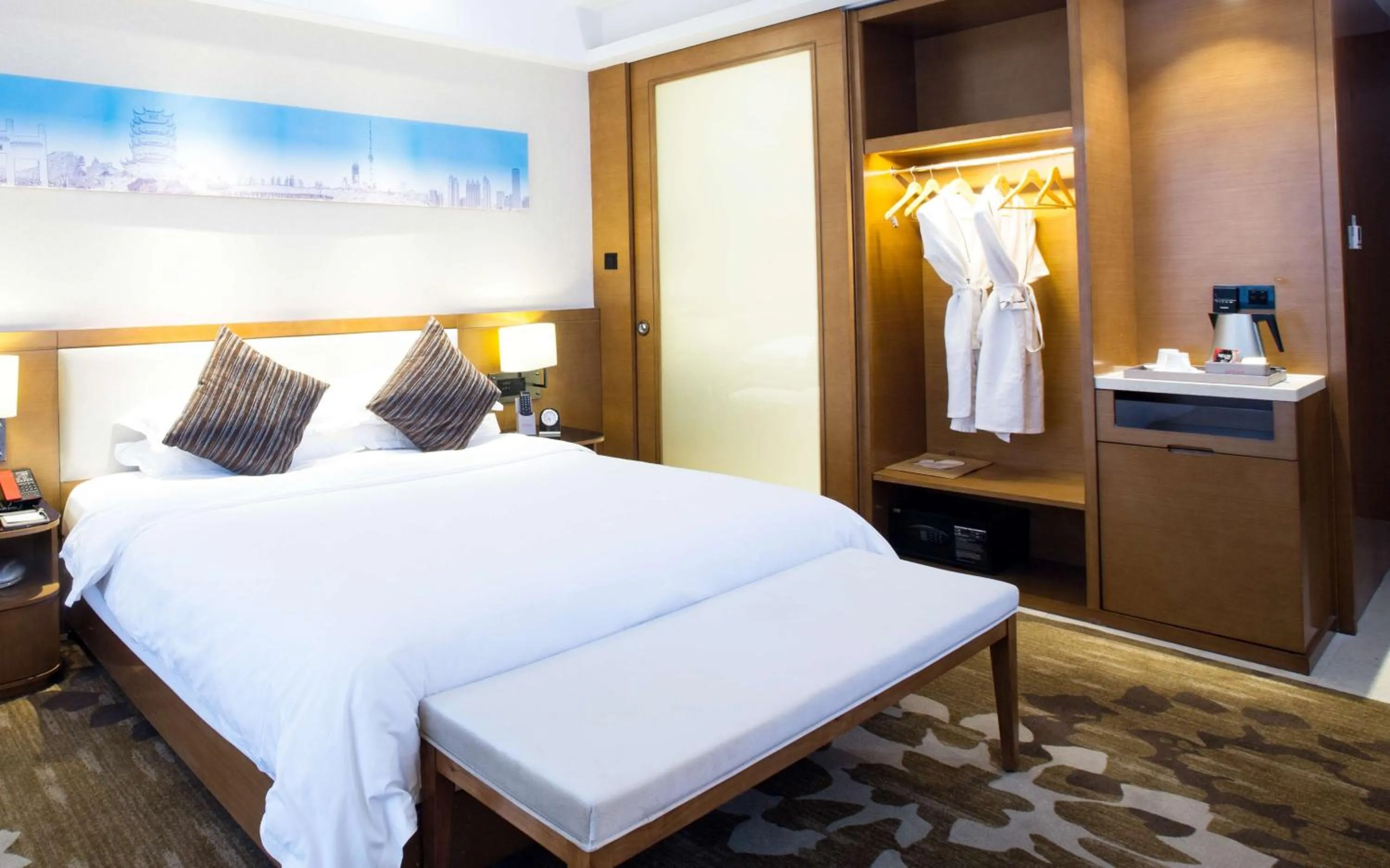 Bed in Ramada Encore Wuhan