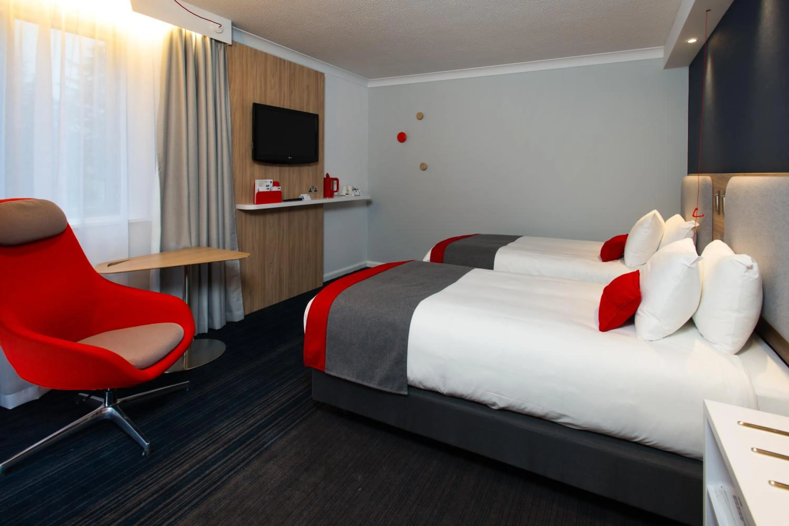 Bedroom, Bed in Holiday Inn Express London Luton Airport by IHG