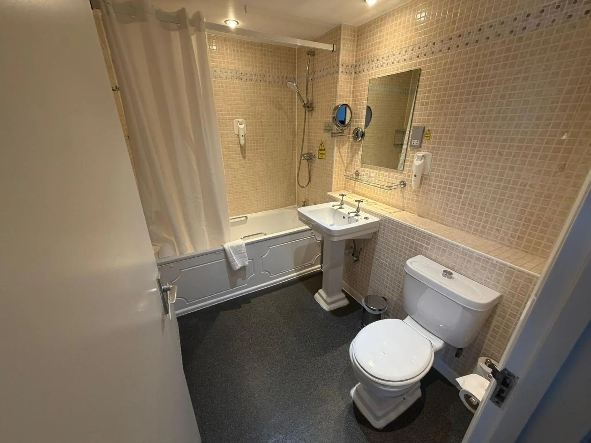 Bathroom in Raven Hotel by Greene King Inns