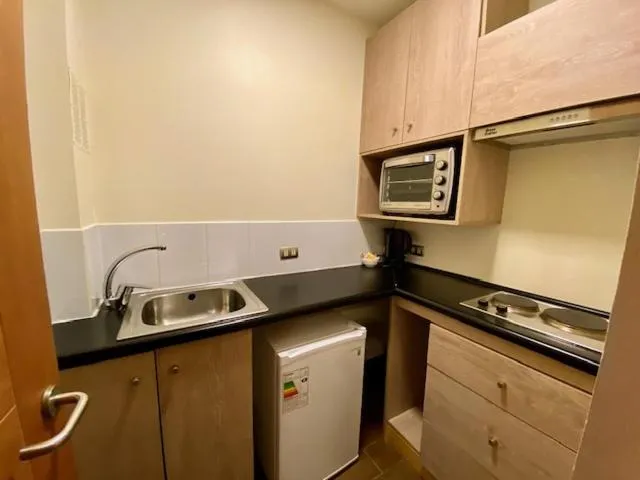 Kitchen or kitchenette in Madero Aysen ApartHotel