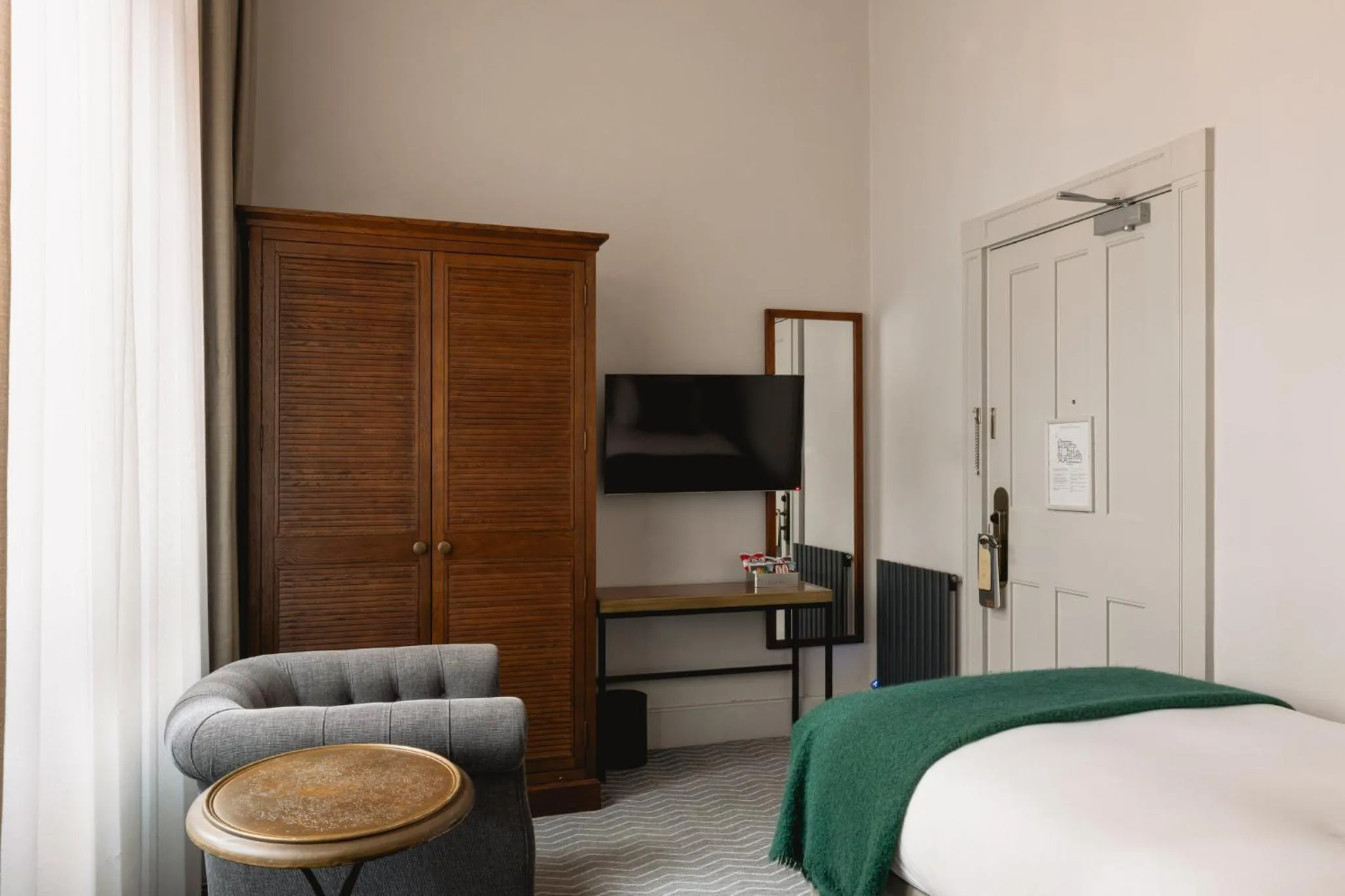 Photo of the whole room, Bed in Kimpton Clocktower by IHG