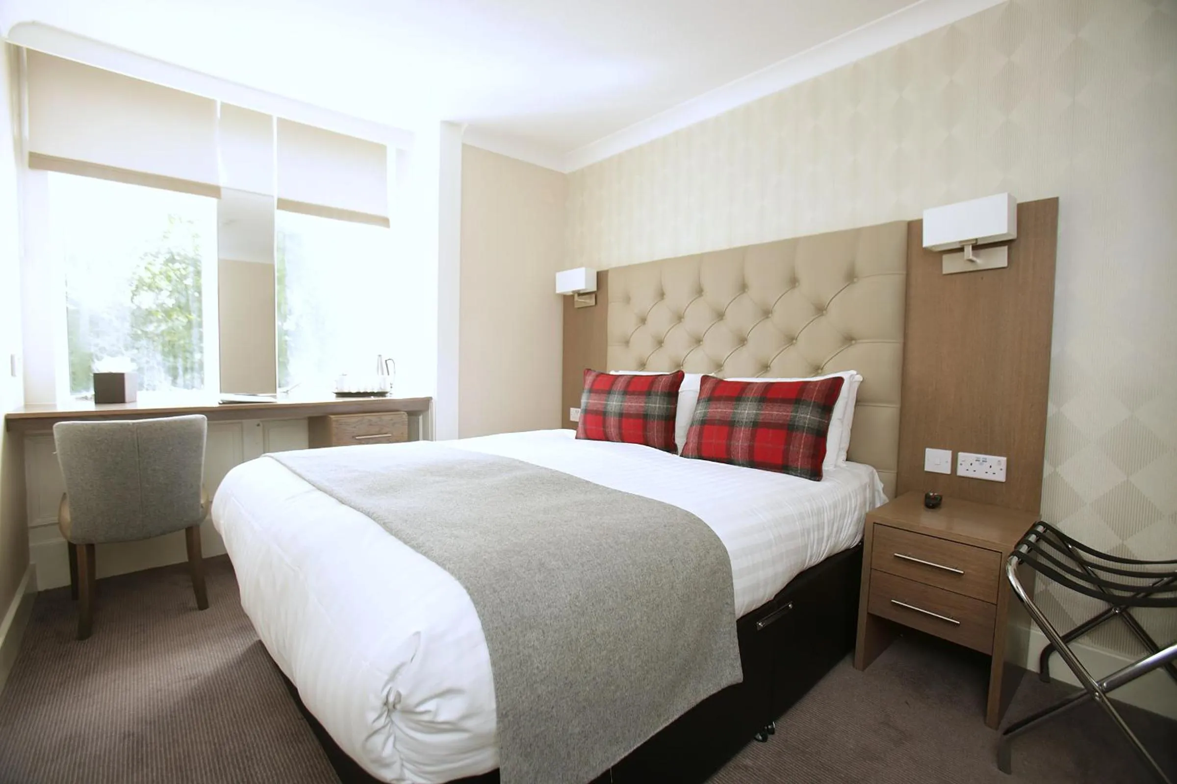 Bed in Ambassador Hotel