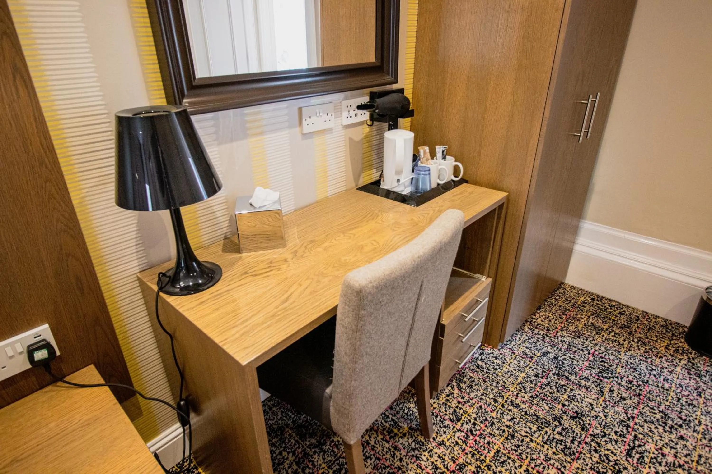 Coffee/tea facilities in Ambassador Hotel