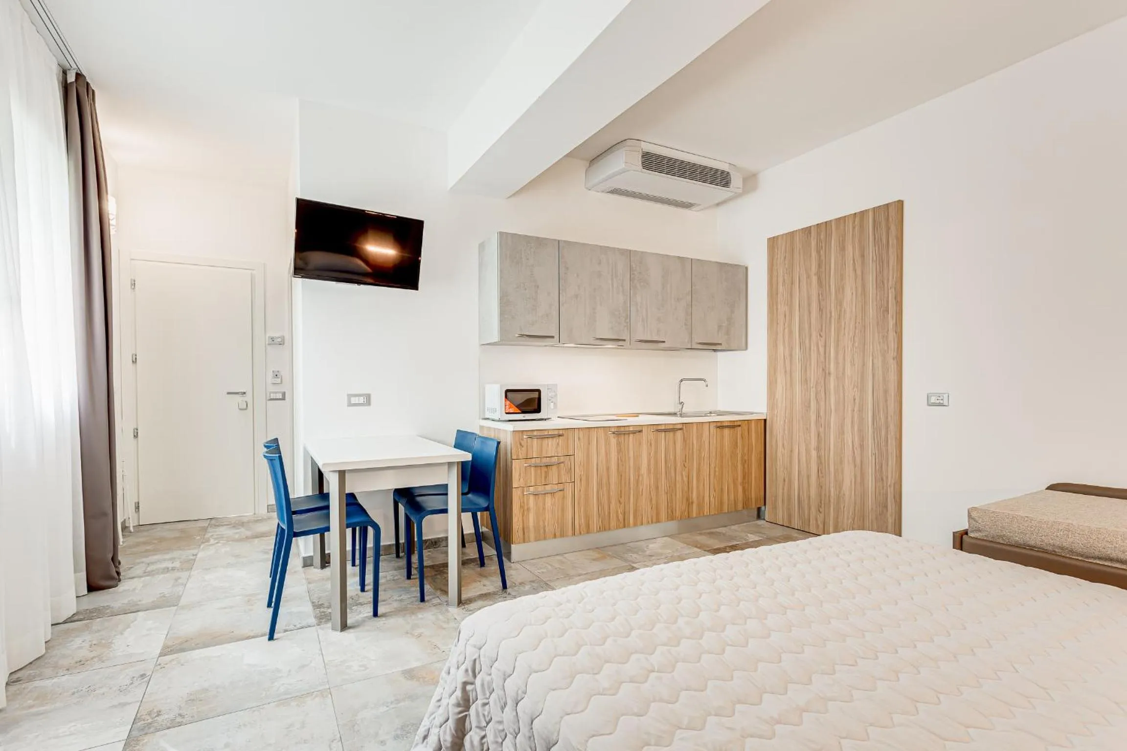 Kitchen or kitchenette, Bed in Hotel Belturismo