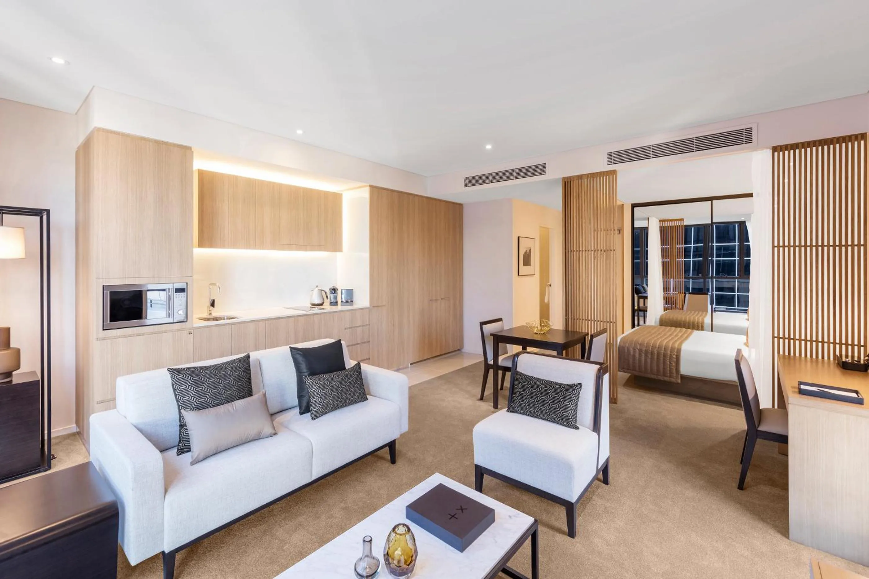 Bed in SKYE Hotel Suites Parramatta